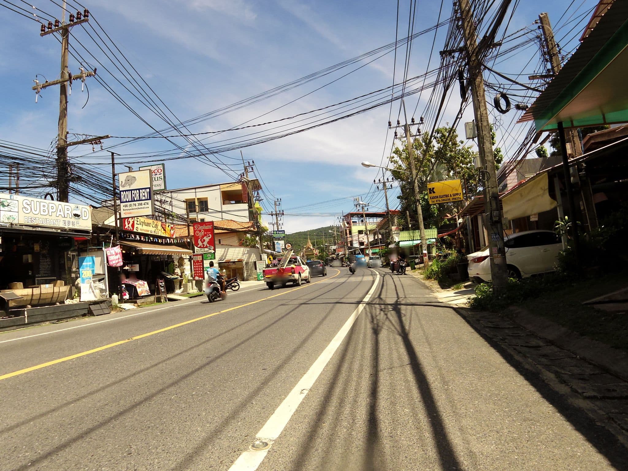 Street view near Pachumas Hotel, Ban Karon — © skillsy (CC BY-SA · Mapillary)