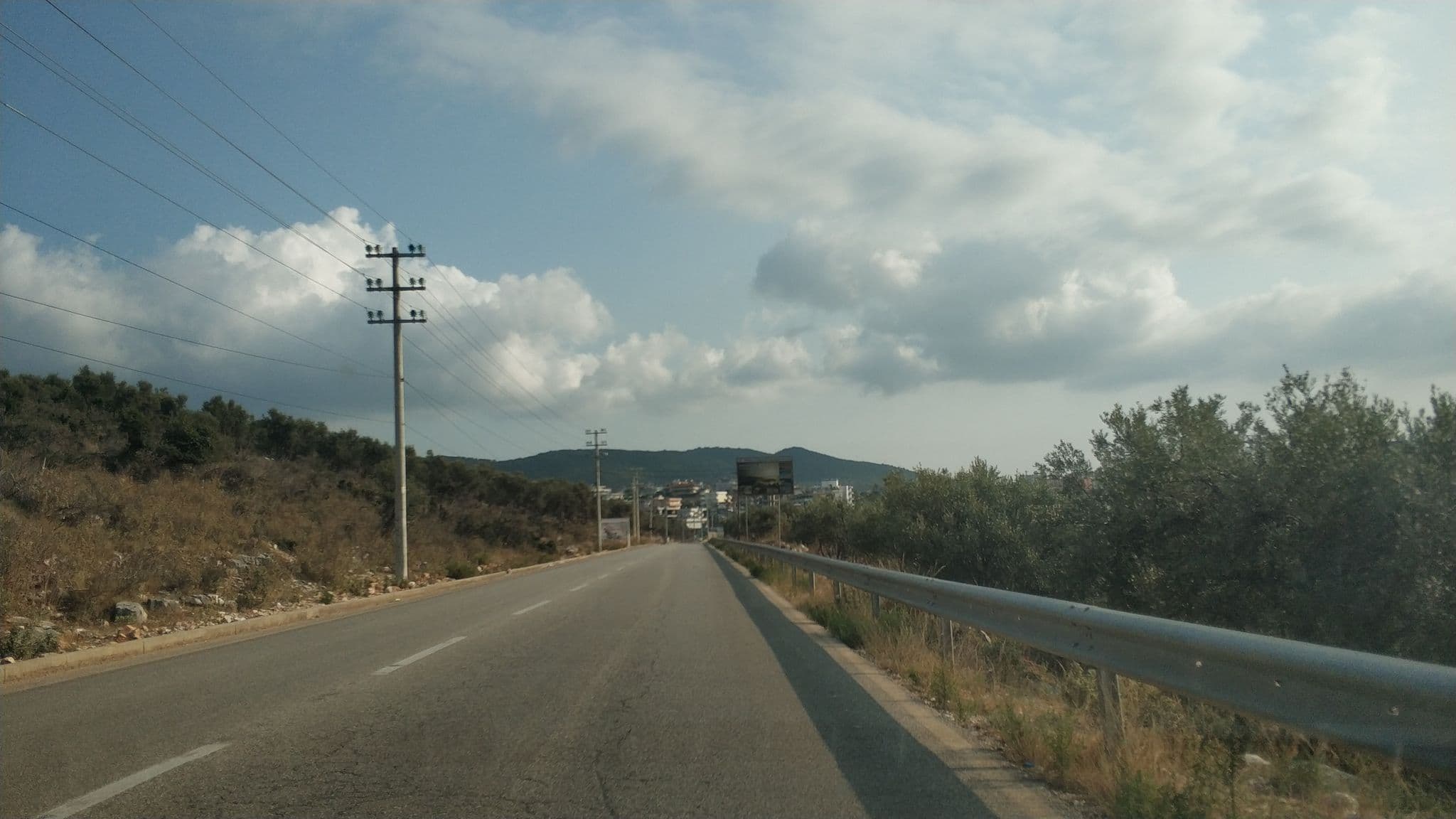 Street view near Neasden Camping With Tents, Ksamil — © freddouhelk (CC BY-SA · Mapillary)