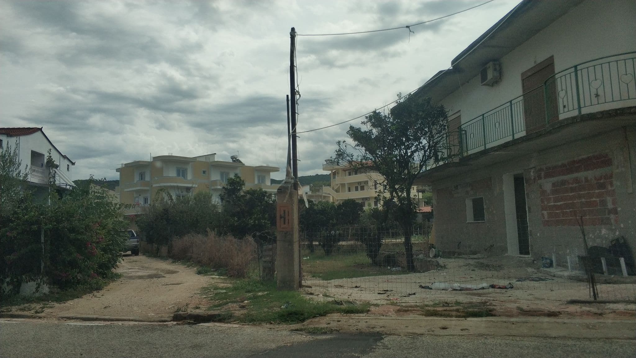 Street view near Idriz Kreka Guest House, Ksamil — © freddouhelk (CC BY-SA · Mapillary)