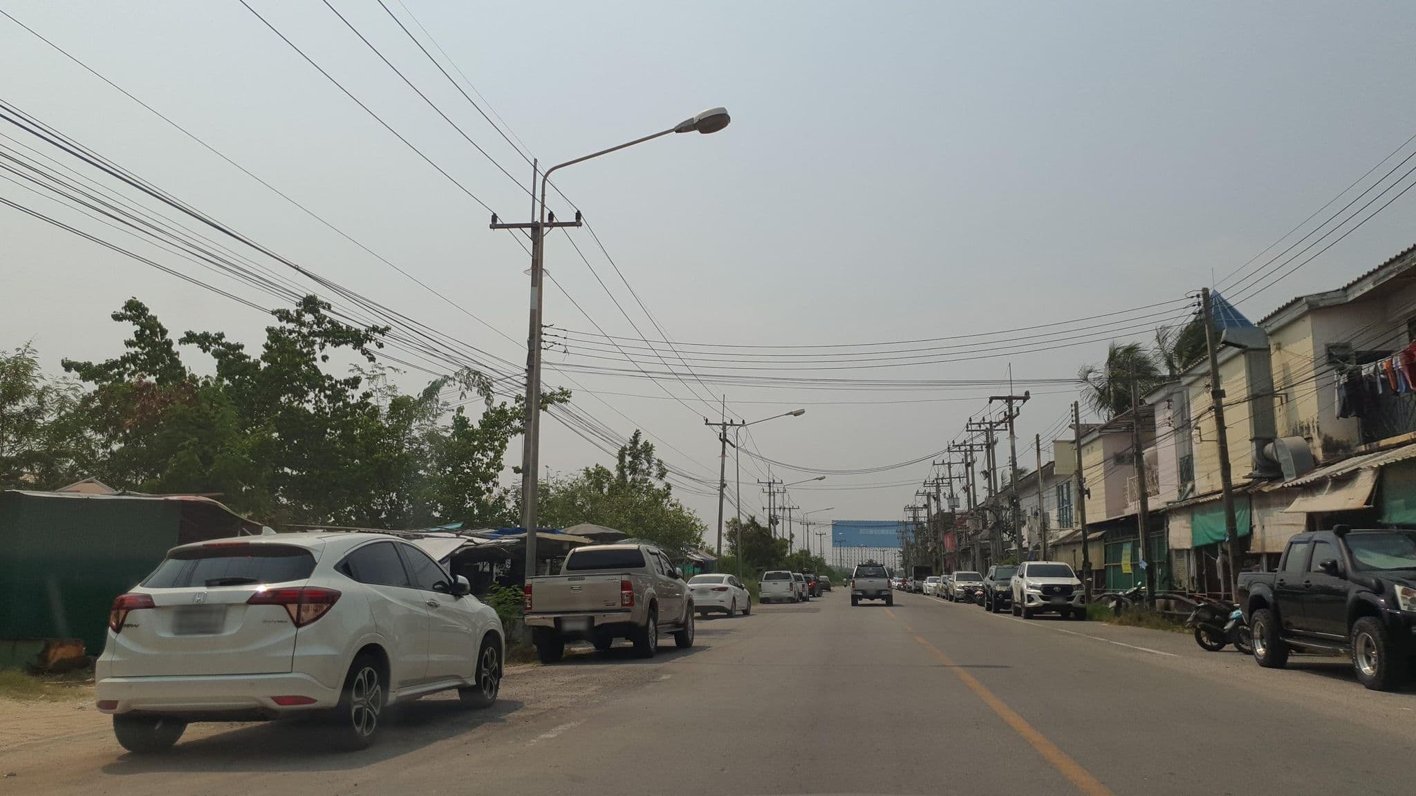 Street view near บ้านพัก Italian thai, Bang Pakong — © jrcarlsen (CC BY-SA · Mapillary)