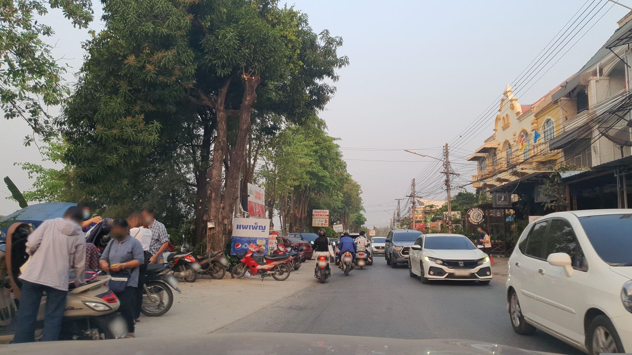 Street view near Little Jasmine by the River (ลิตเติ้ล จัสมิน), Phitsanulok — © jrcarlsen (CC BY-SA · Mapillary)