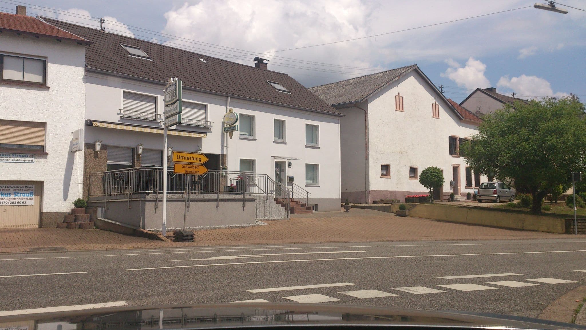 Street view near Pension & Gaststätte Handelshof, Schwalbach — © teddy73 (CC BY-SA · Mapillary)