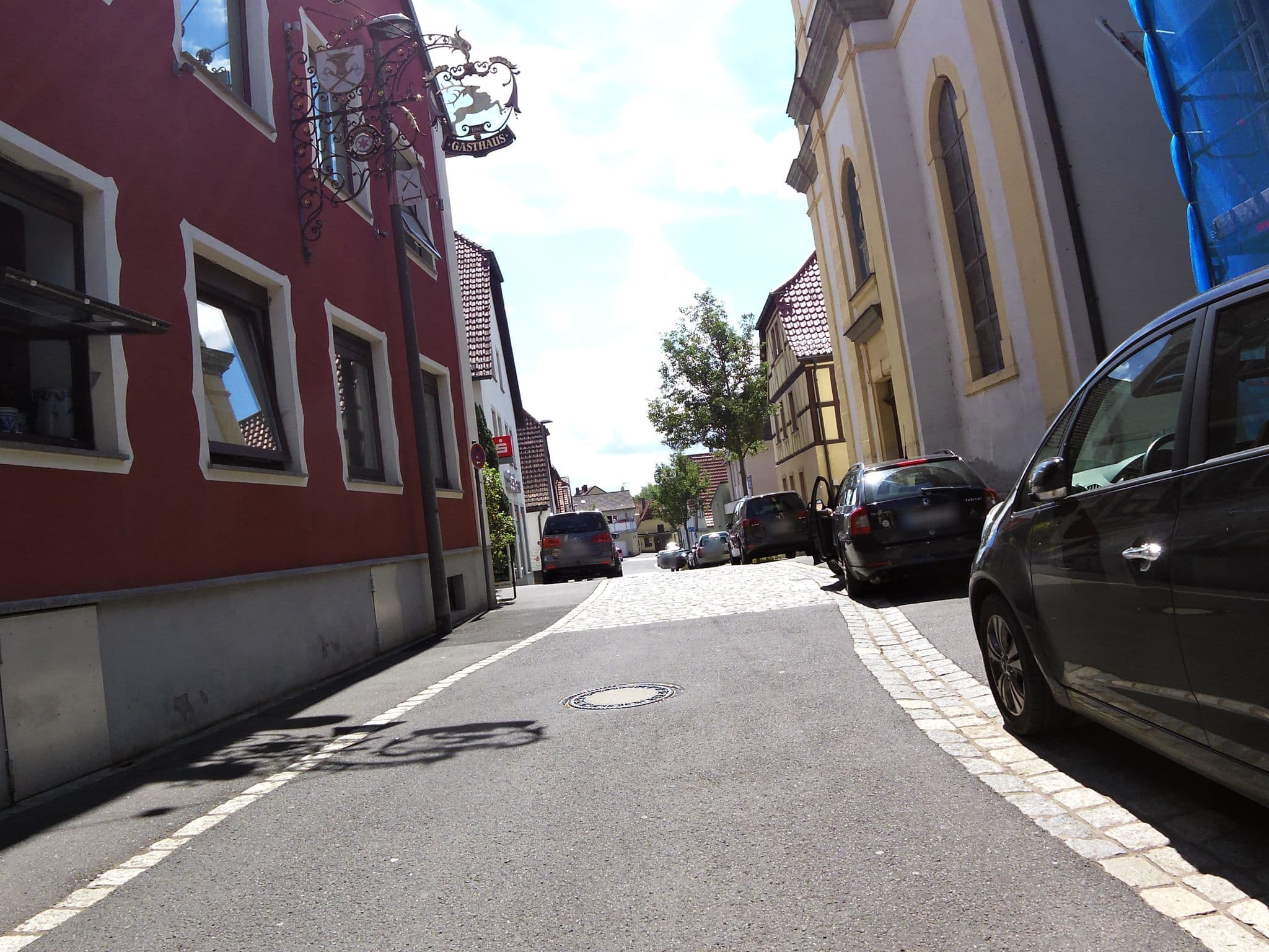 Street view near Gasthaus & Hotel Zum Hirschen, Estenfeld — © zoegglmeyr (CC BY-SA · Mapillary)
