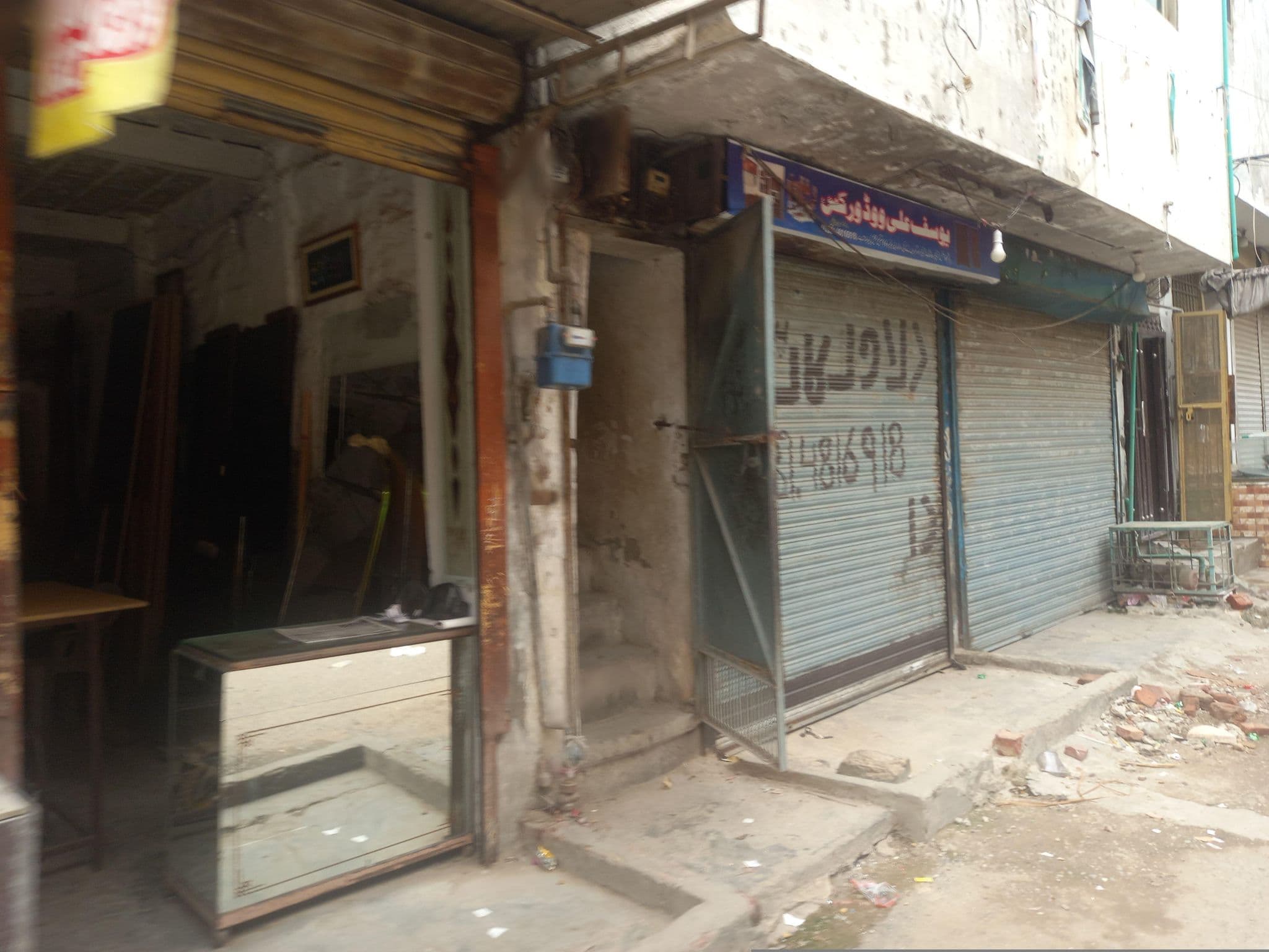 Street view near Al-Rasheed Boys Hostel, Model Town — © hamzajutt (CC BY-SA · Mapillary)