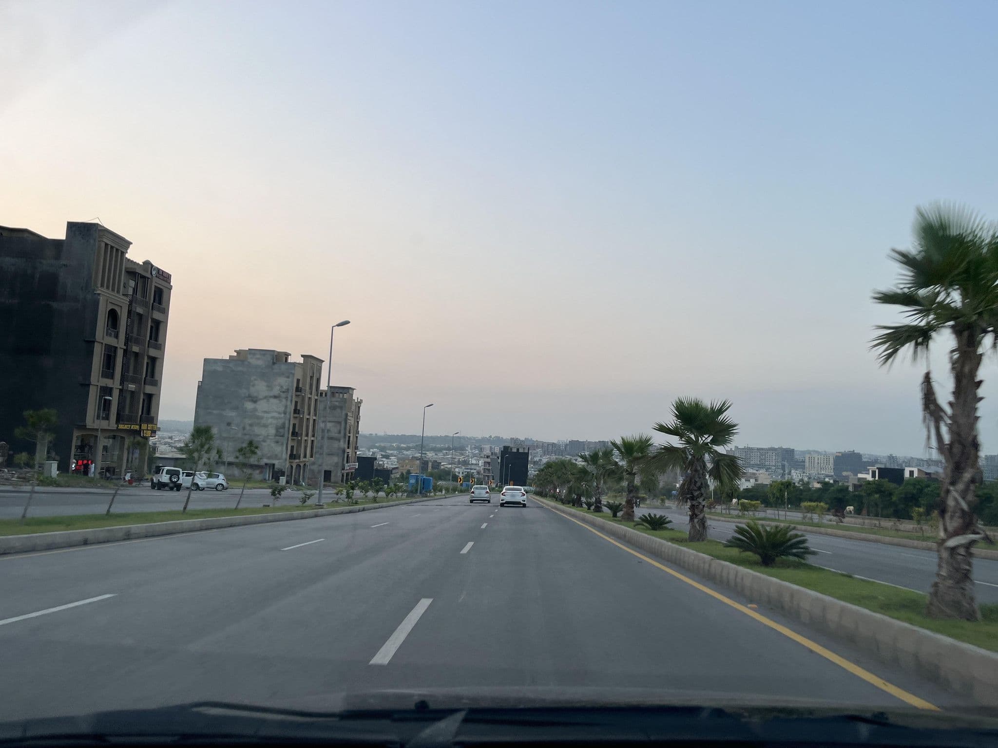 Street view near Qinwan Hotel & Suites, Rawalpindi — © masterofnoroad (CC BY-SA · Mapillary)