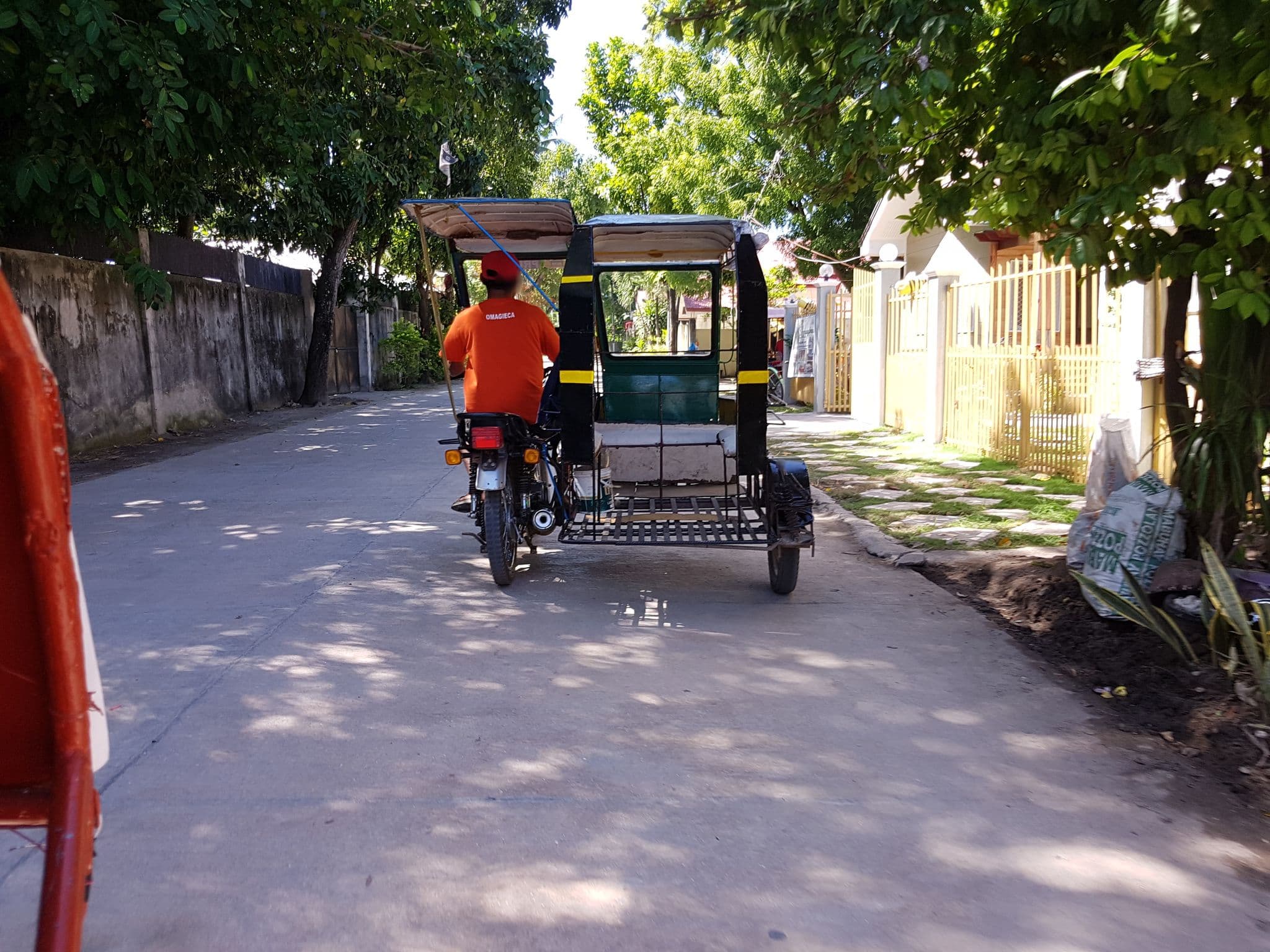 Street view near Tristan's Beach Resort and Restaurant, Ocoy — © axe (CC BY-SA · Mapillary)
