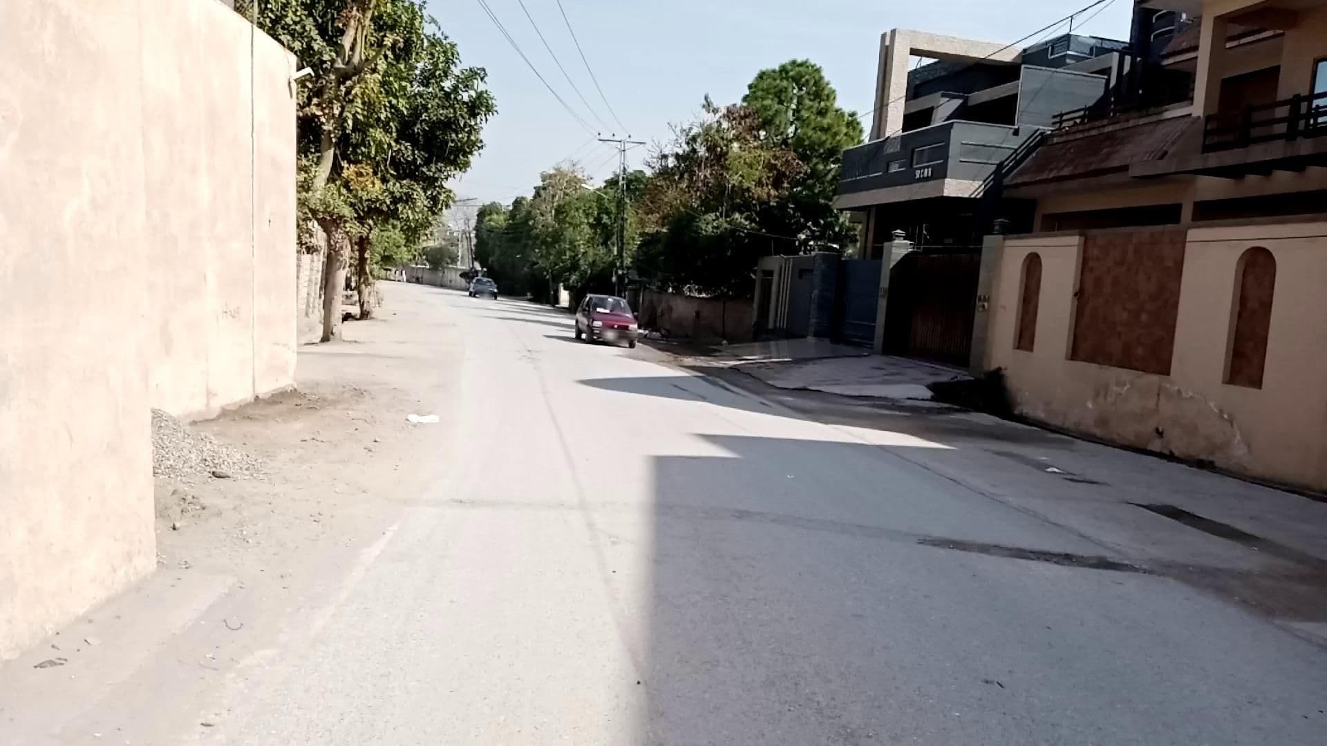 Street view near Grand Berkshire Hotel Peshawar, Peshawar — © RobinGoix (CC BY-SA · Mapillary)