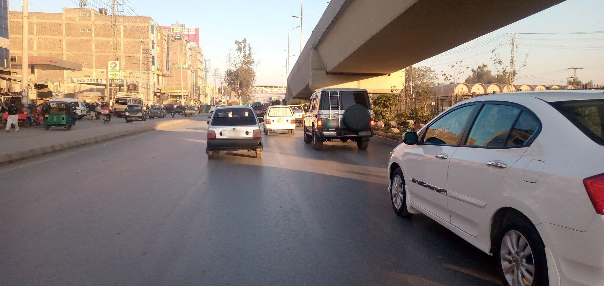 Street view near New Madina Hotel, Peshawar — © RobinGoix (CC BY-SA · Mapillary)
