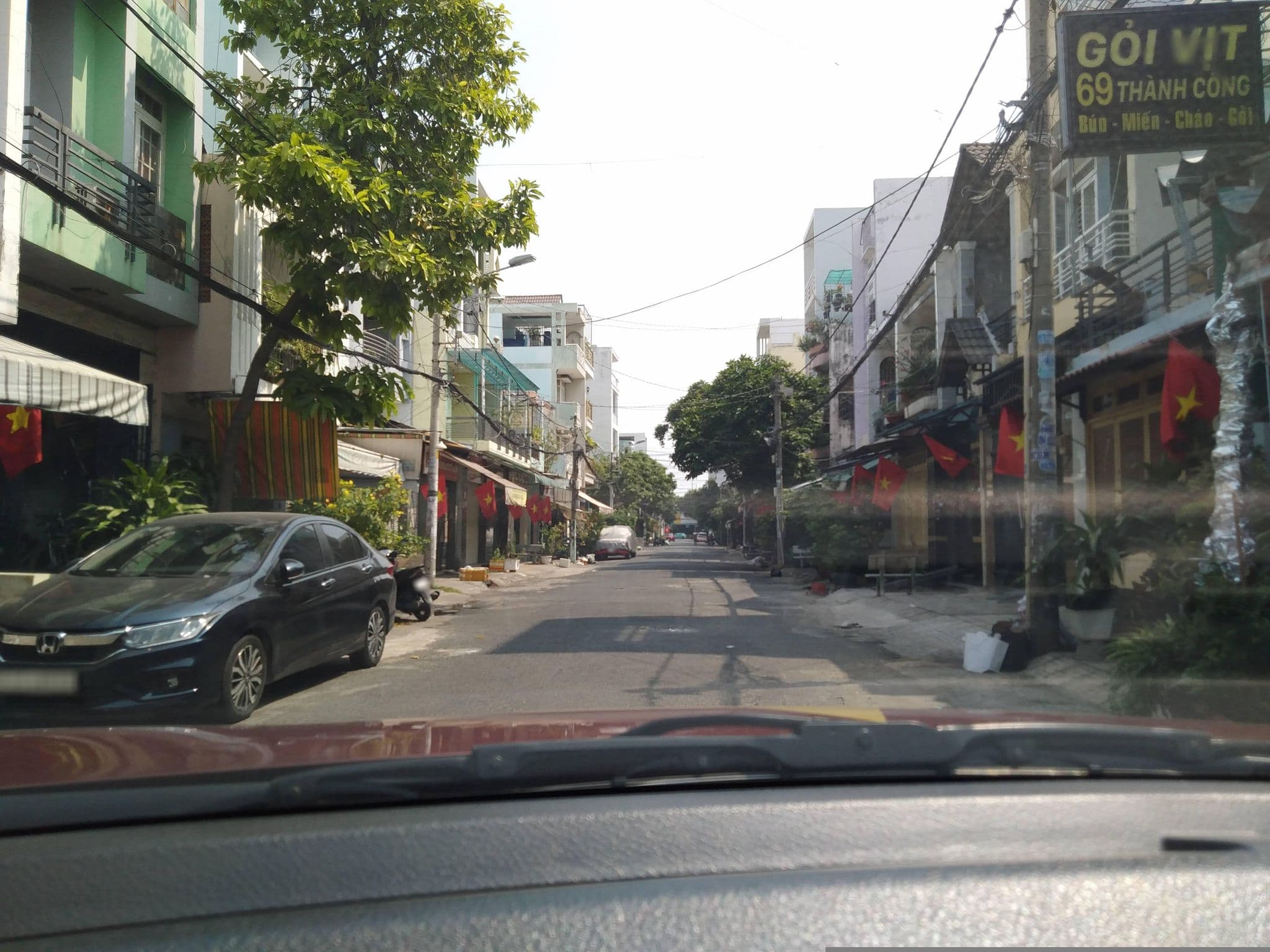Street view near Trang An Happy Hotel, Tân Bình — © sg_front_1 (CC BY-SA · Mapillary)