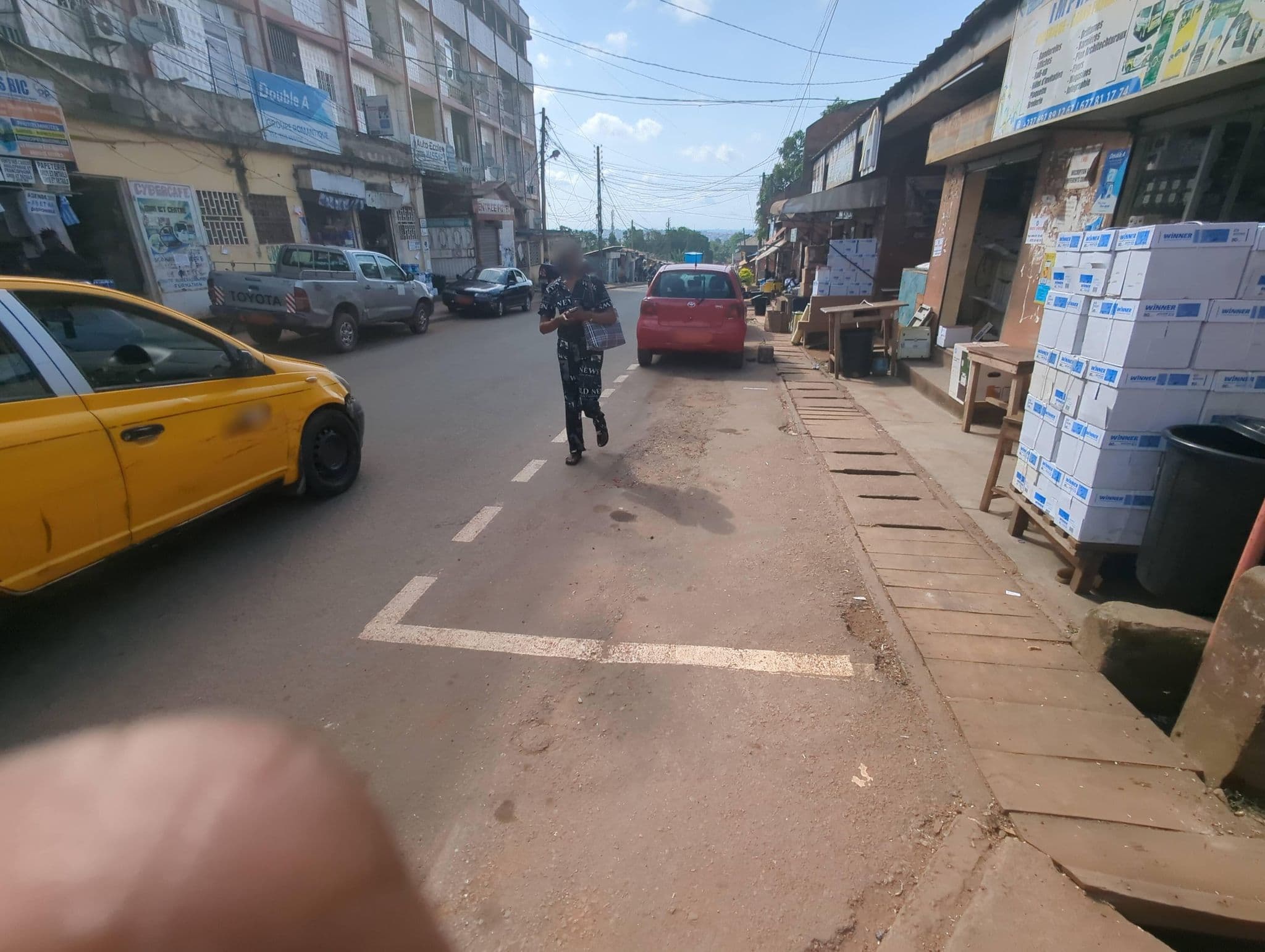 Street view near Hôtel les Ancêtres, Yaoundé — © Gojo237 (CC BY-SA · Mapillary)