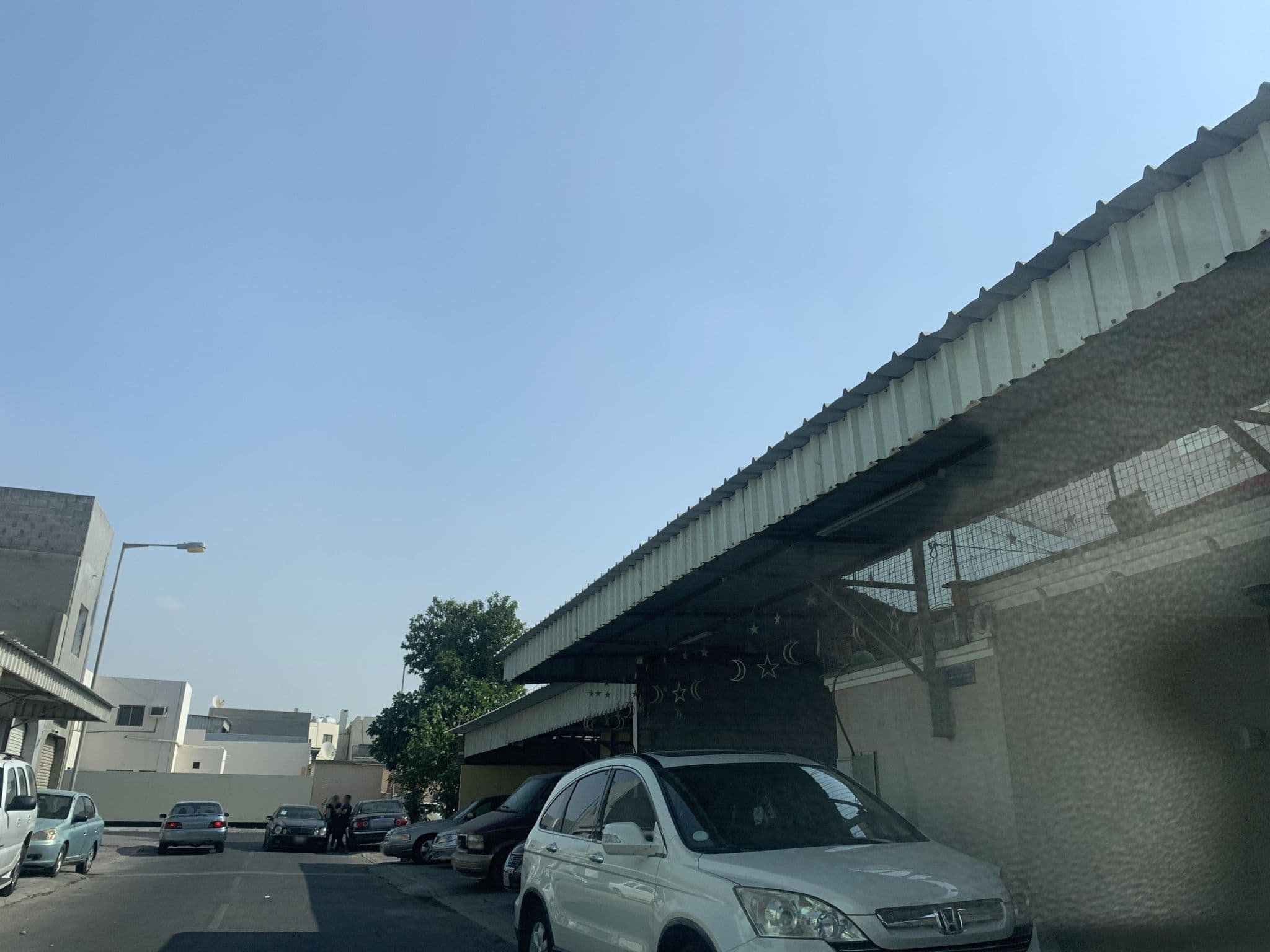 Street view near My home, Madīnat Ḩamad — © sherif1234 (CC BY-SA · Mapillary)