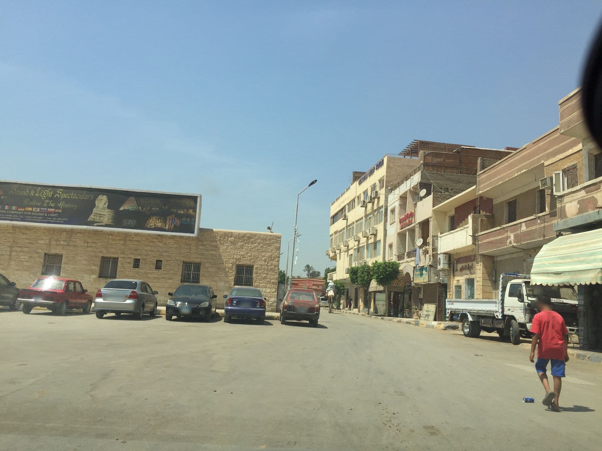 Street view near Sahara Pyramid Inn, Abū an Numrus — © aymanali (CC BY-SA · Mapillary)