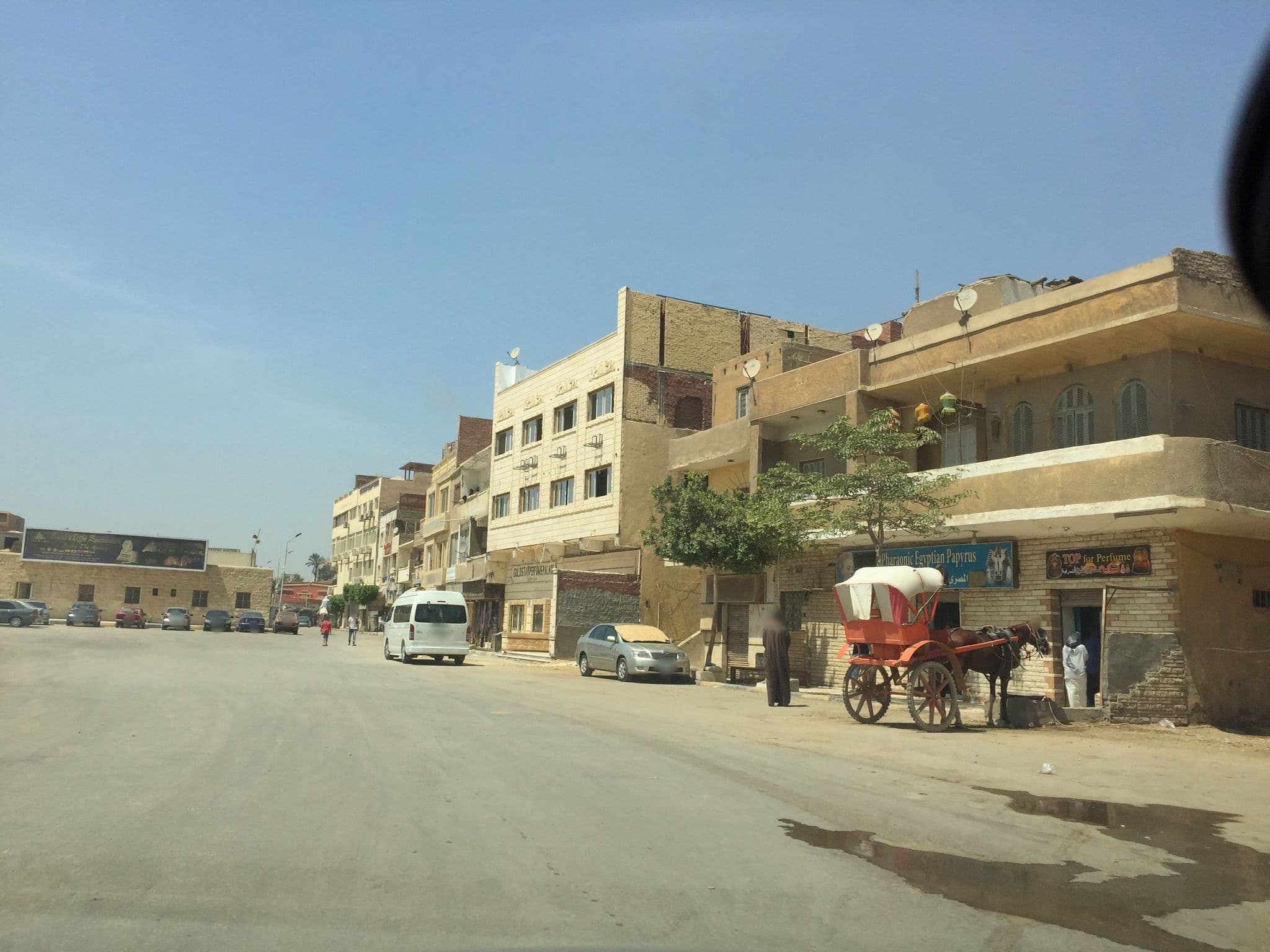 Street view near shadow pyramids view inn, Abū an Numrus — © aymanali (CC BY-SA · Mapillary)