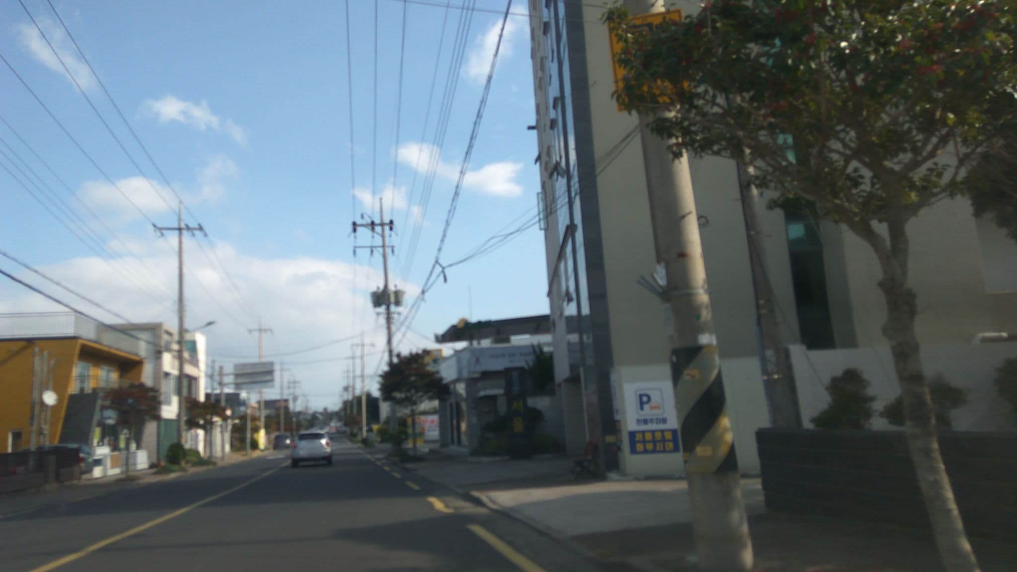 Street view near 토마토모텔, Seogwipo — © eneerhut (CC BY-SA · Mapillary)