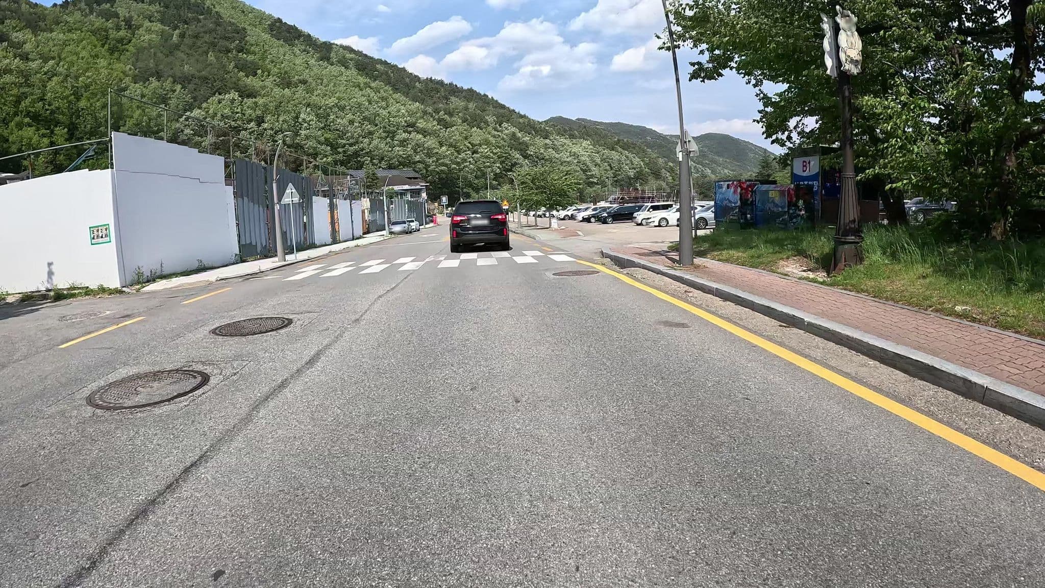 Street view near 설악리조텔, Sokcho — © eneerhut (CC BY-SA · Mapillary)