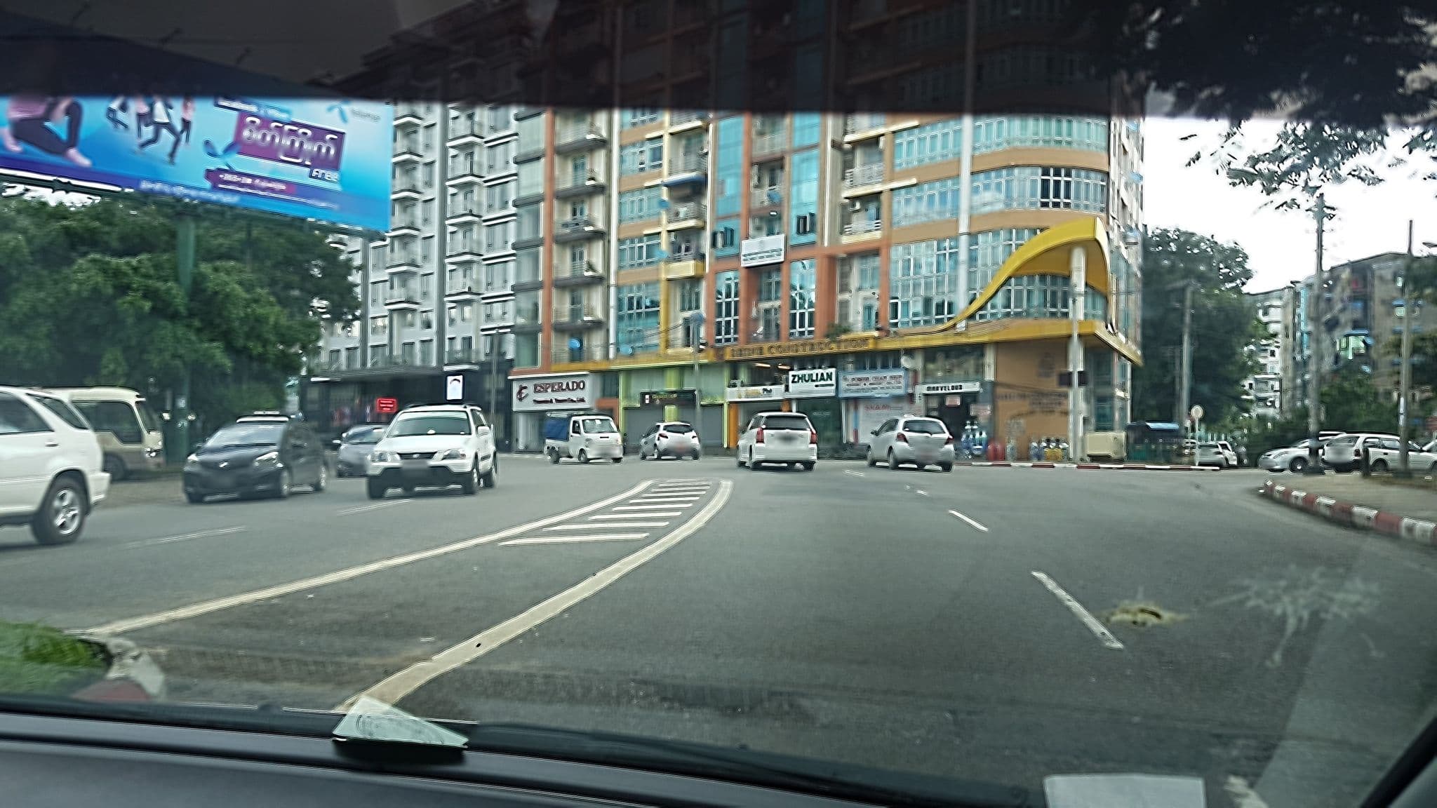 Street view near Wyndham Grand Yangon Hotel, Mingala Tangnyunt — © aungphone (CC BY-SA · Mapillary)
