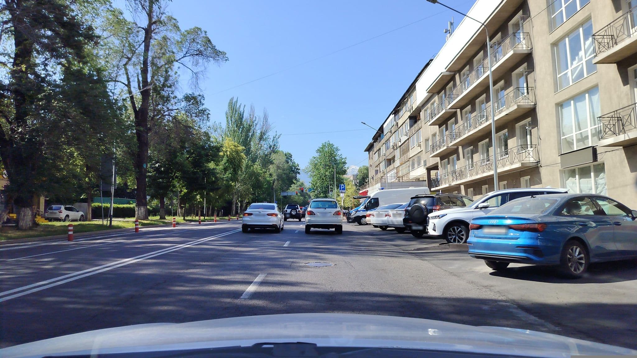 Street view near City Hotel Tien Shan, Almaty — © sevenmp (CC BY-SA · Mapillary)