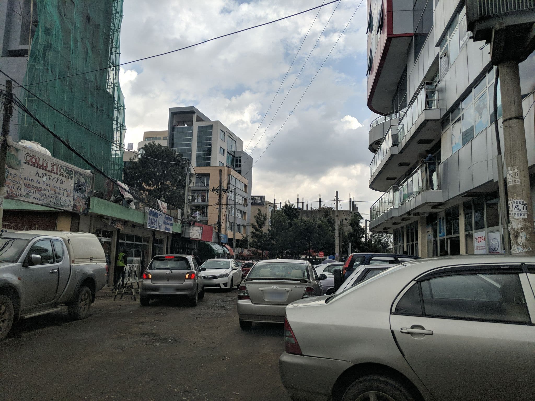 Street view near Helzer Hotel, Addis Ababa — © addismap_alex (CC BY-SA · Mapillary)