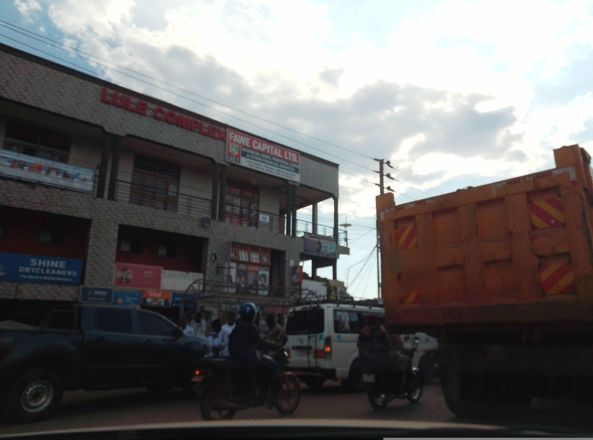 Street view near Holy Fam Hotel, Nansana — © bagonzars (CC BY-SA · Mapillary)