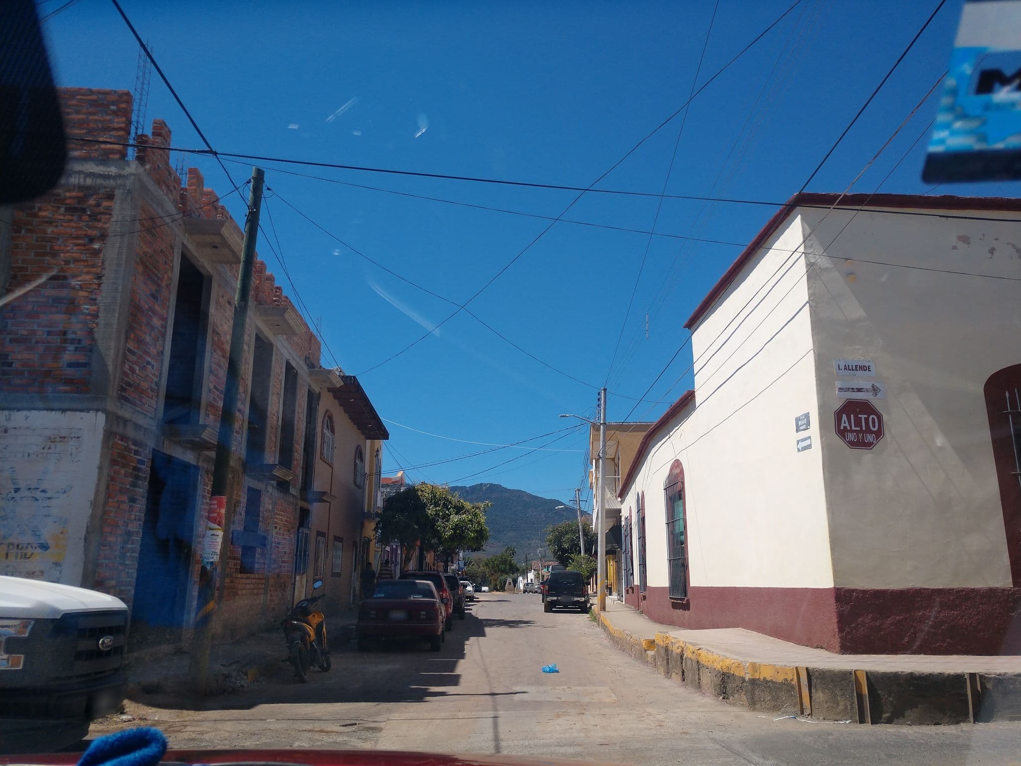 Street view near Don Peter Bungalows, Compostela — © eddie845 (CC BY-SA · Mapillary)