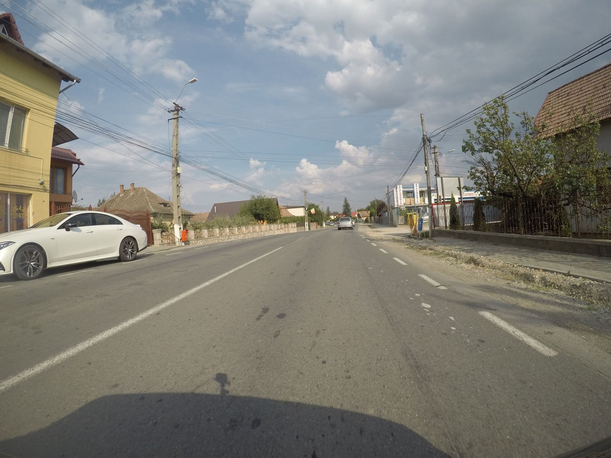 Street view near Pensiunea Maria, Mihai Viteazu — © chrisbeddow (CC BY-SA · Mapillary)