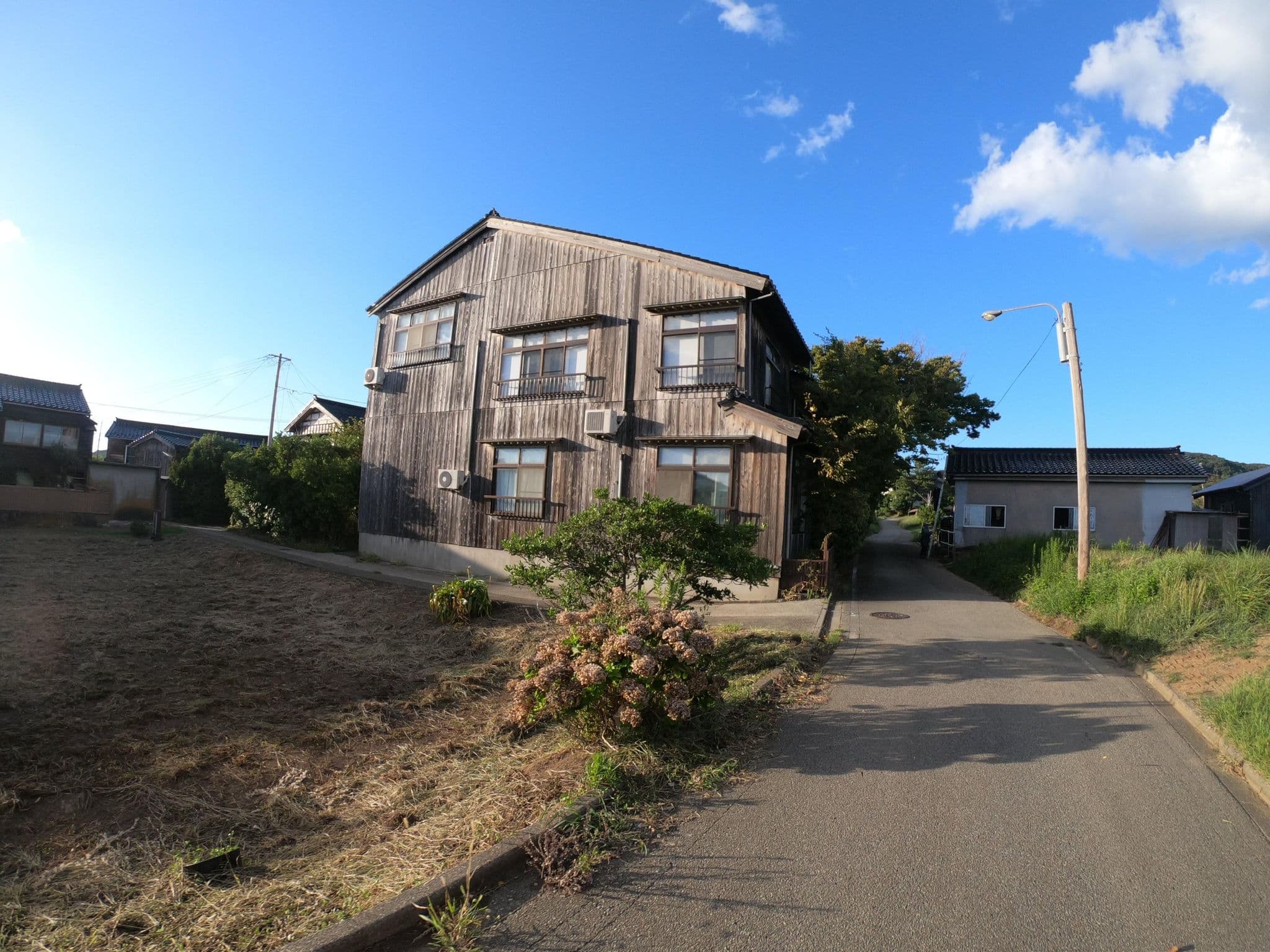 Street view near 民宿 高山, Sado — © 24dakenlo (CC BY-SA · Mapillary)