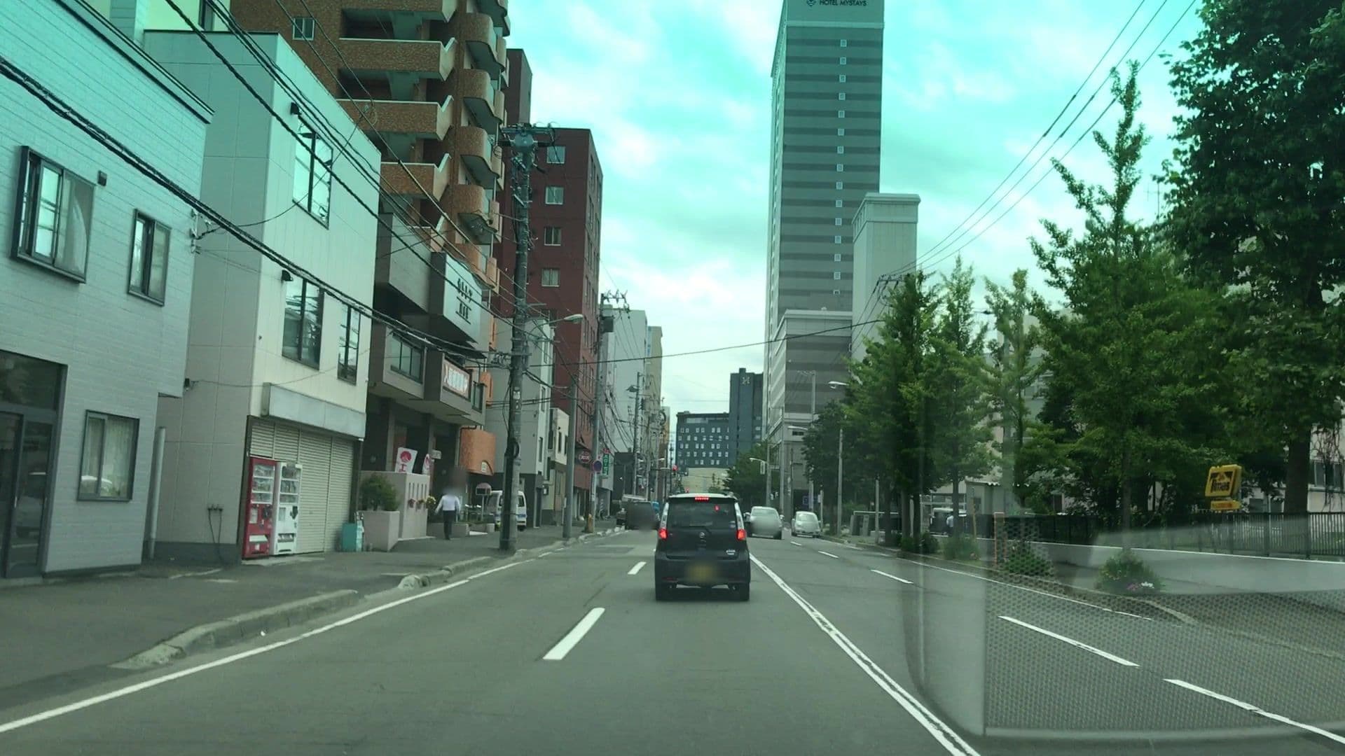 Street view near タイムピースアパートメント, Sapporo — © lvl5 (CC BY-SA · Mapillary)