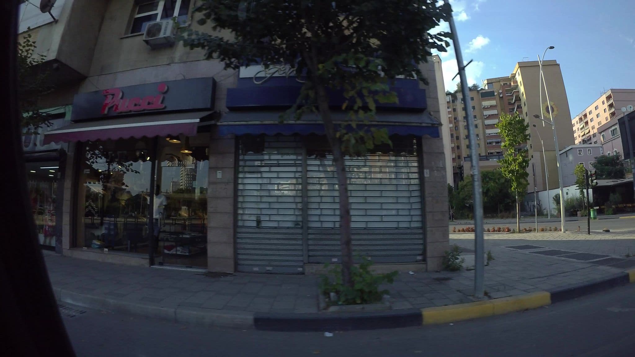 Street view near Enjoy Downtown Modern Apartment, Tirana — © kaart5 (CC BY-SA · Mapillary)