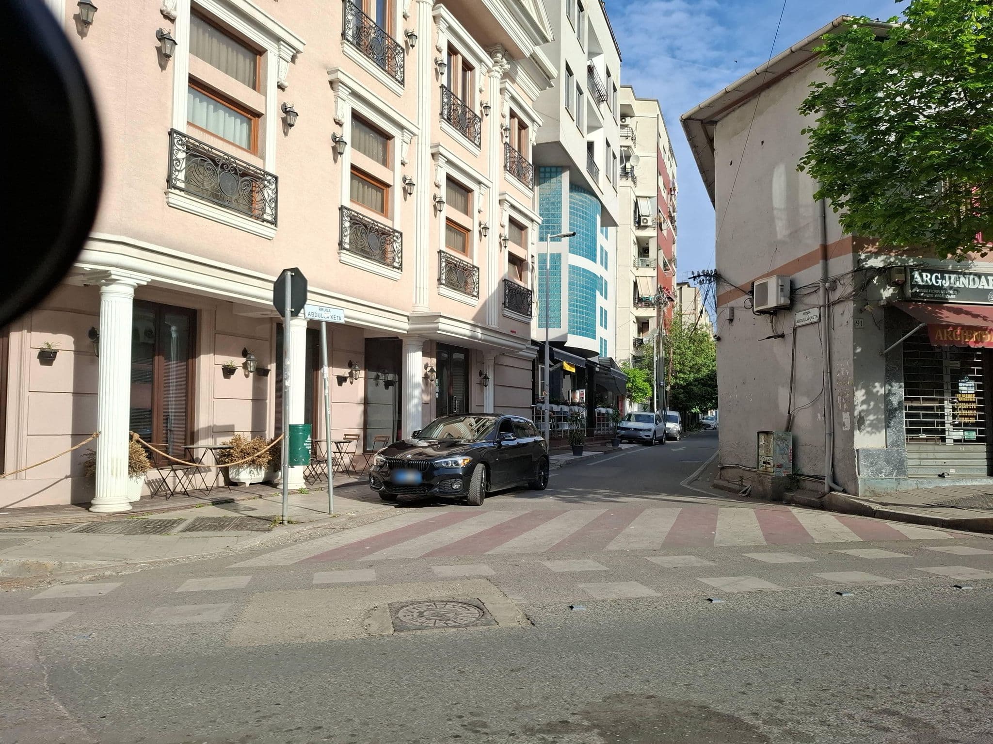 Street view near Hotel Stela, Tirana — © denisju_osm (CC BY-SA · Mapillary)