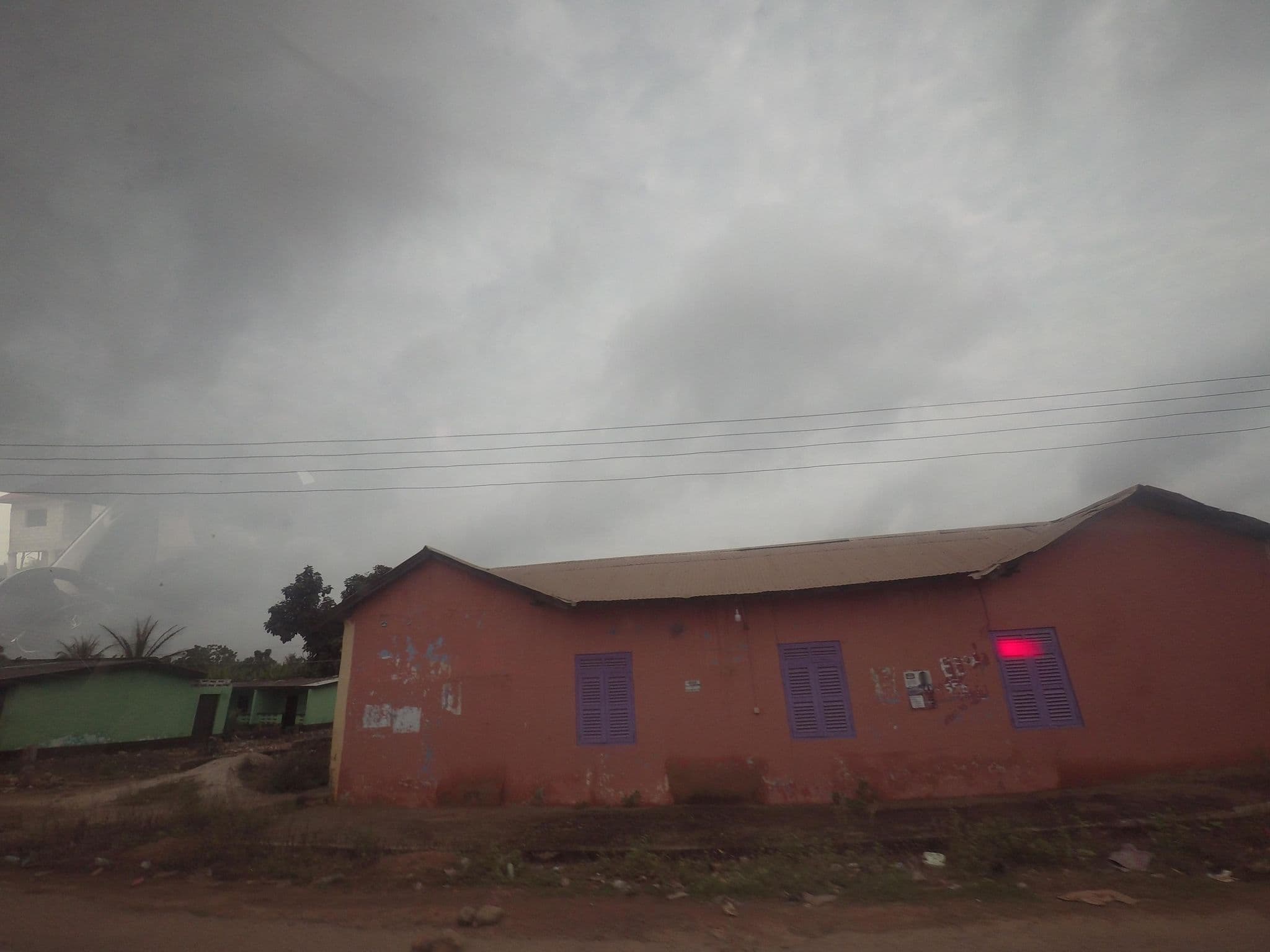 Street view near Coconut Grove Hotel, Mankesim — © cmenttor (CC BY-SA · Mapillary)