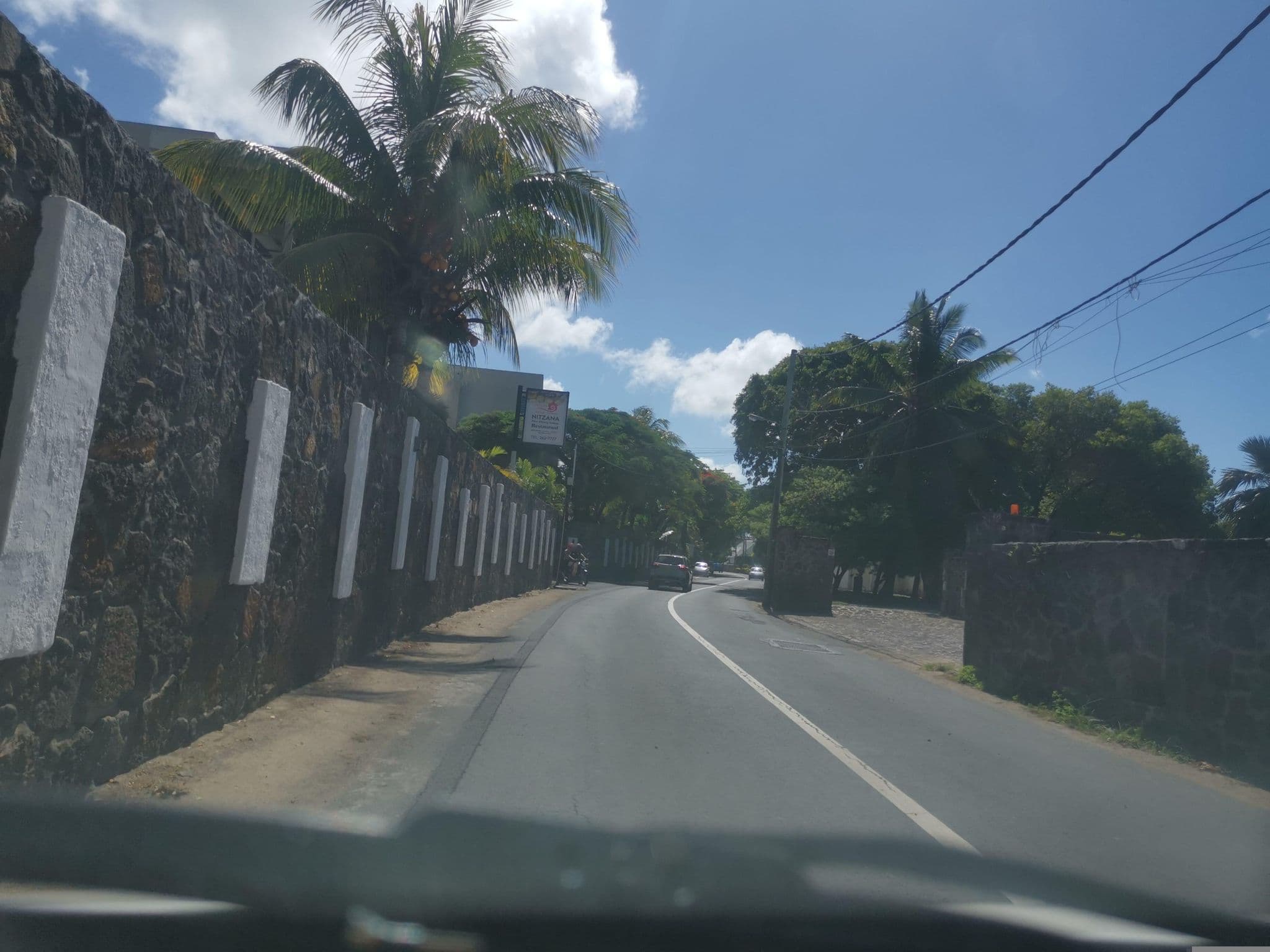 Street view near Nitzana Mauritius Apartment Hotel & Restaurant, Cap Malheureux — © armandr (CC BY-SA · Mapillary)