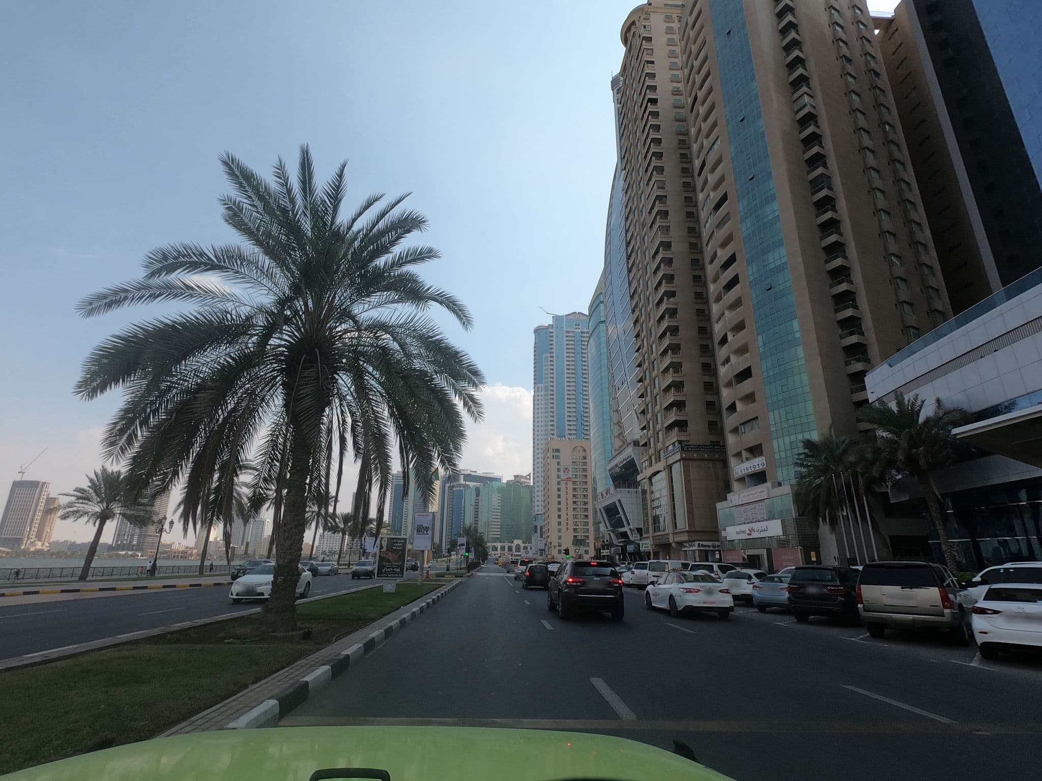 Street view near Corniche Al Buhaira Hotel, Al Majaz — © countzero5 (CC BY-SA · Mapillary)