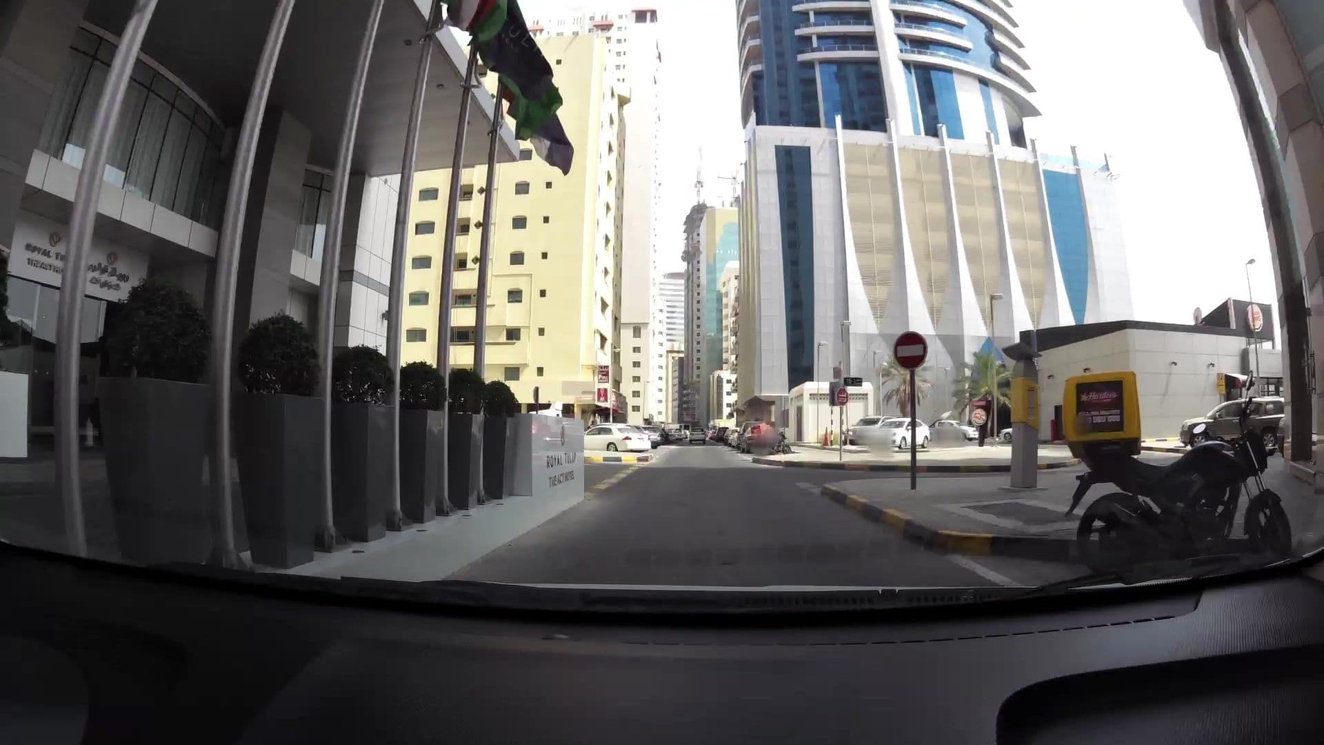 Street view near Royal Tulip Act Hotel, Al Majaz — © kaartcam (CC BY-SA · Mapillary)