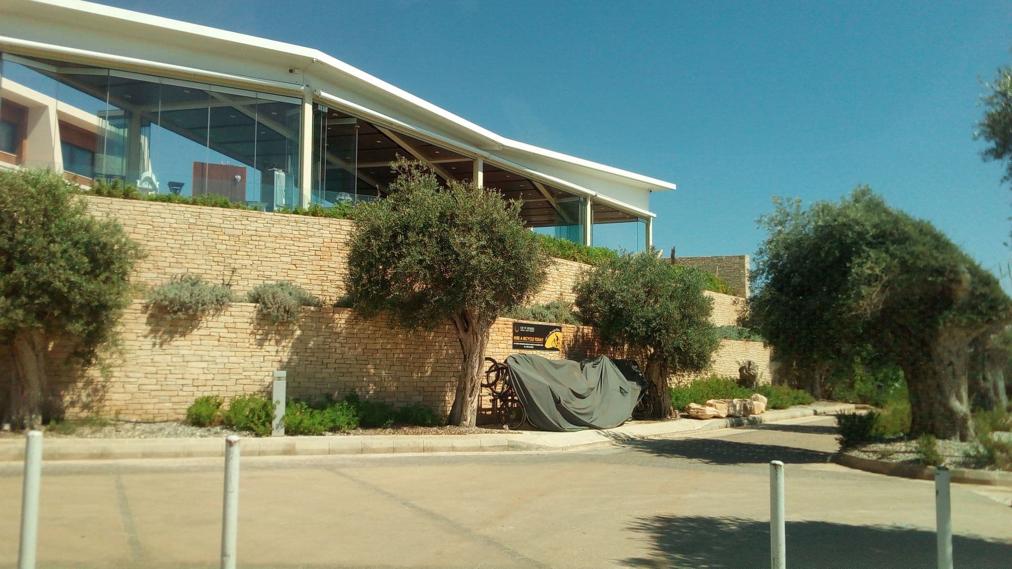 Street view near Cap St. Georges Beach Club Resort, Pégeia — © stpkyriakou (CC BY-SA · Mapillary)