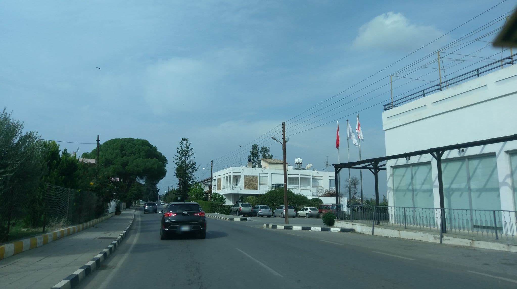 Street view near Lyoness Güzelyurt Sunum, Mórfou — © ozkanilyasaksu (CC BY-SA · Mapillary)