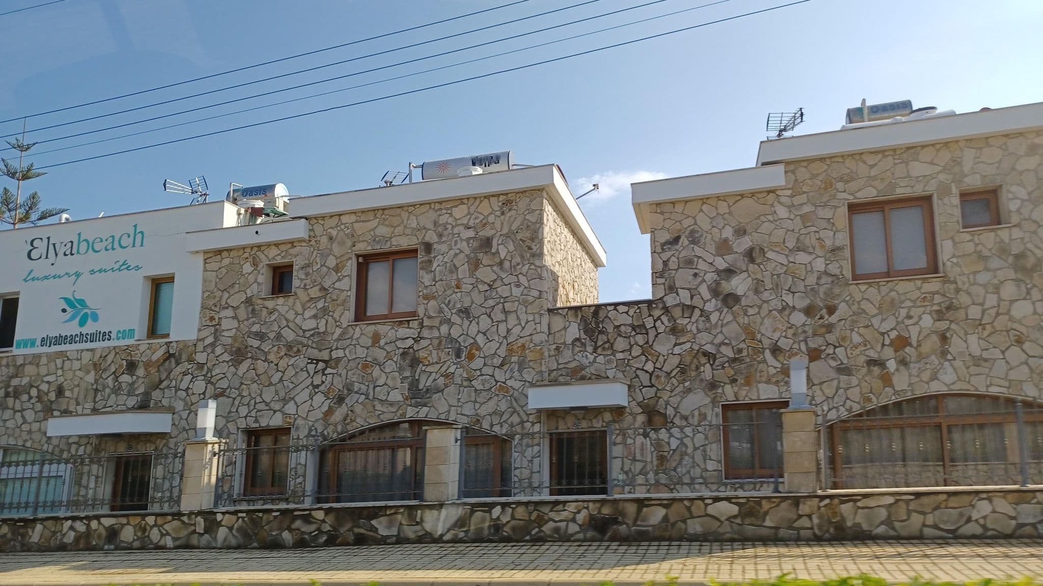 Street view near Divine Cost Apartments, Kofínou — © noa1 (CC BY-SA · Mapillary)