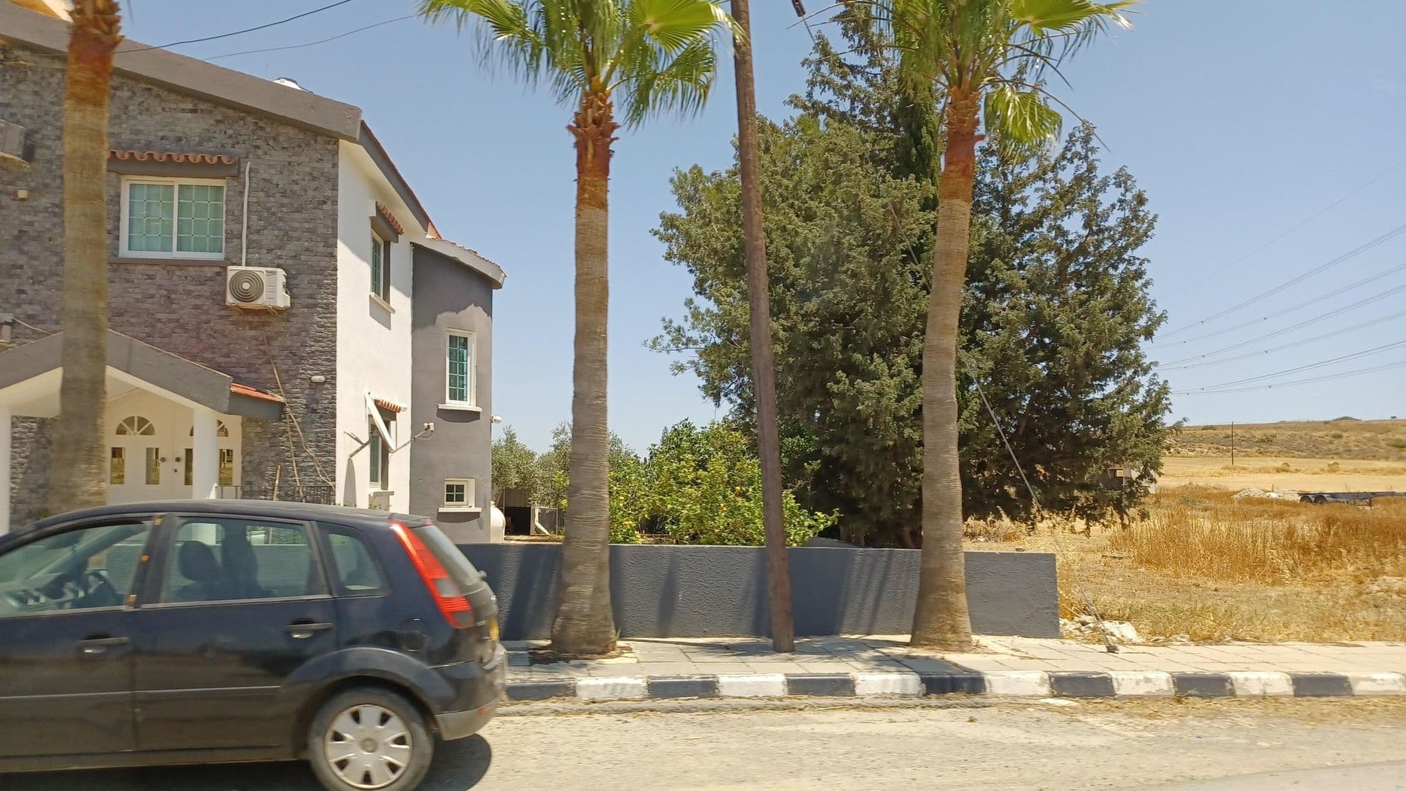 Street view near Banikkos Tavern, Pýla — © noa1 (CC BY-SA · Mapillary)