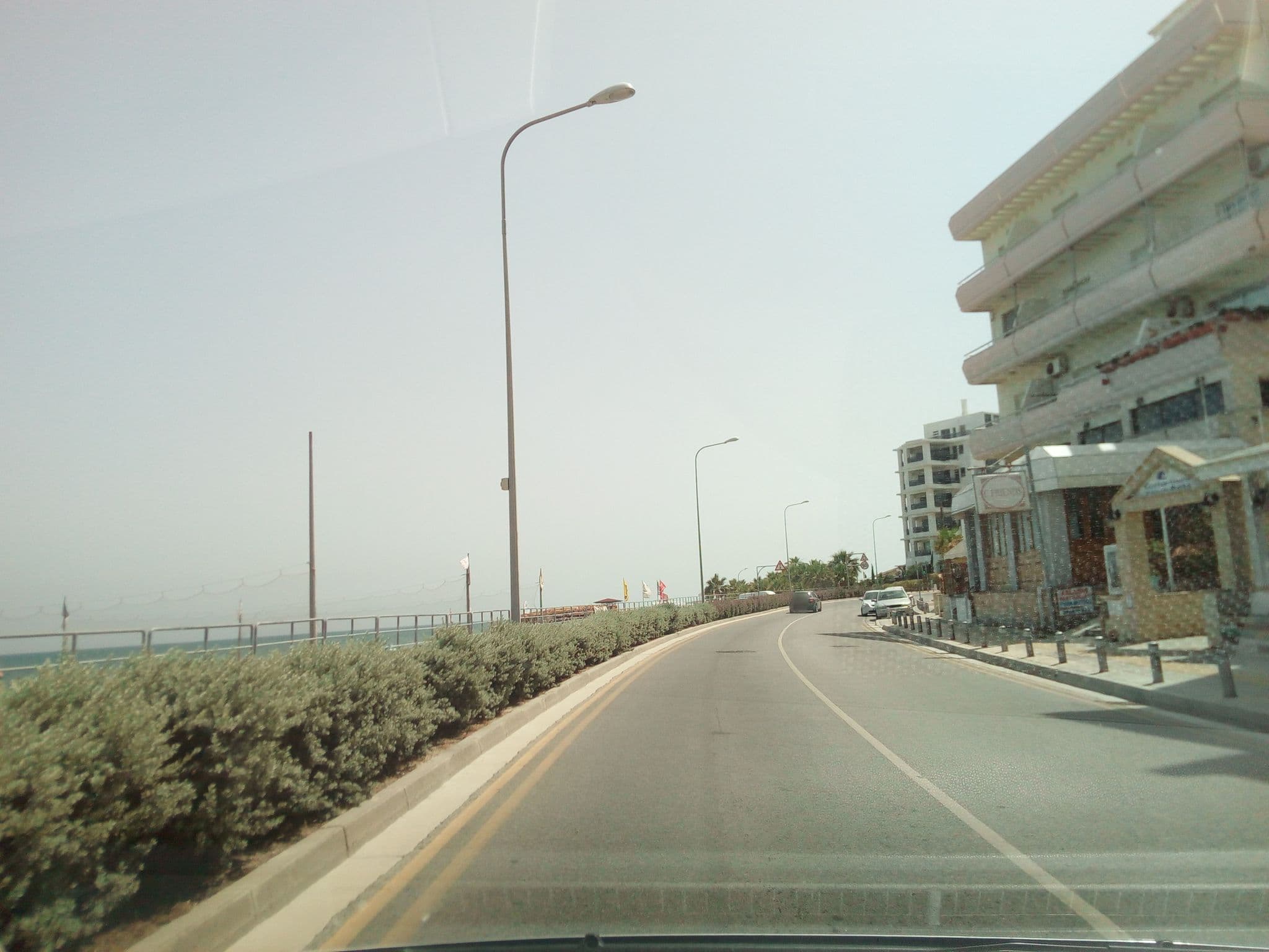 Street view near Costantiana Beach Hotel Apartments, Larnaca — © stpkyriakou (CC BY-SA · Mapillary)