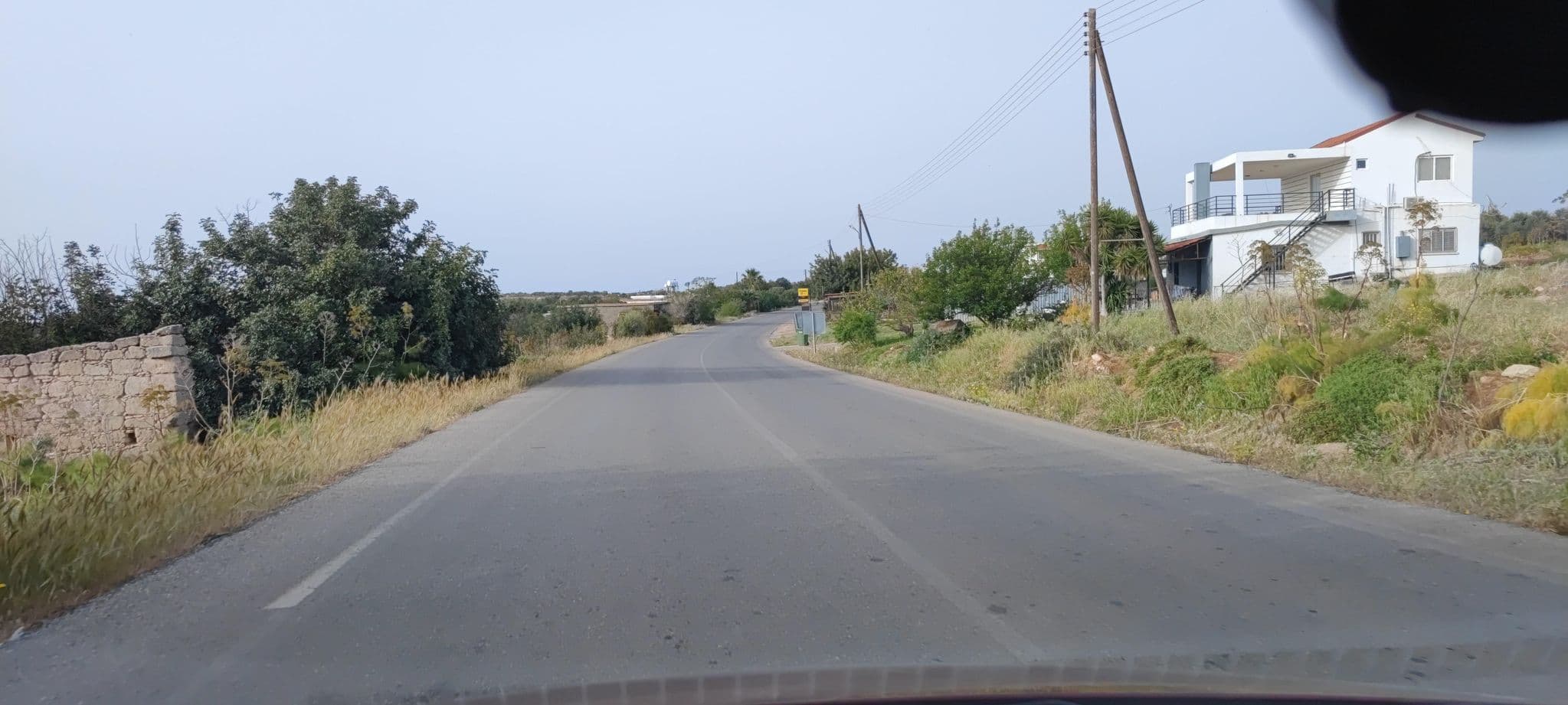 Street view near Kaya Artemis, Aigialoúsa — © WhanTwo (CC BY-SA · Mapillary)