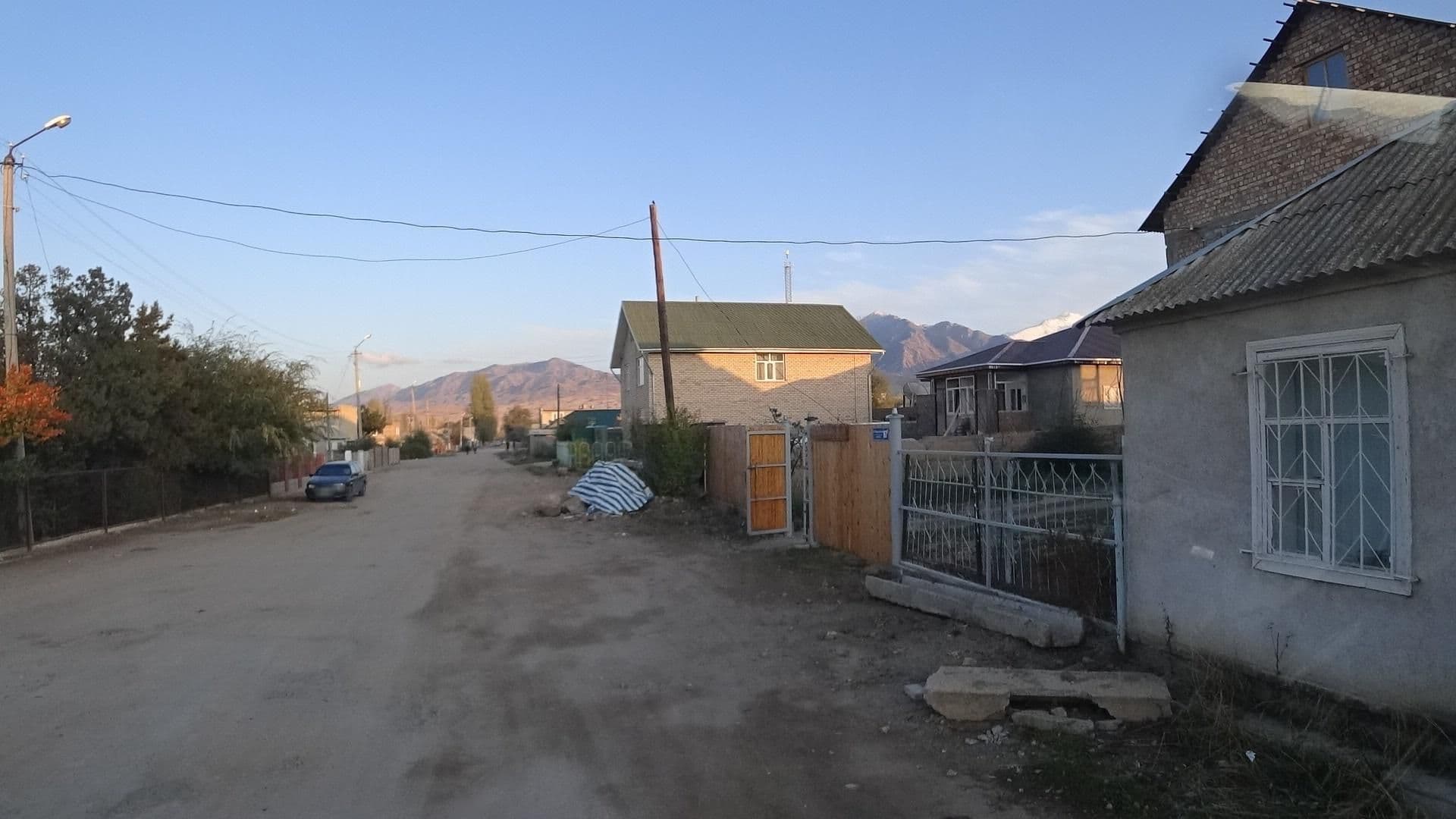 Street view near Altyn Oimok Guesthouse, Bokombayevskoye — © vbombaerts (CC BY-SA · Mapillary)