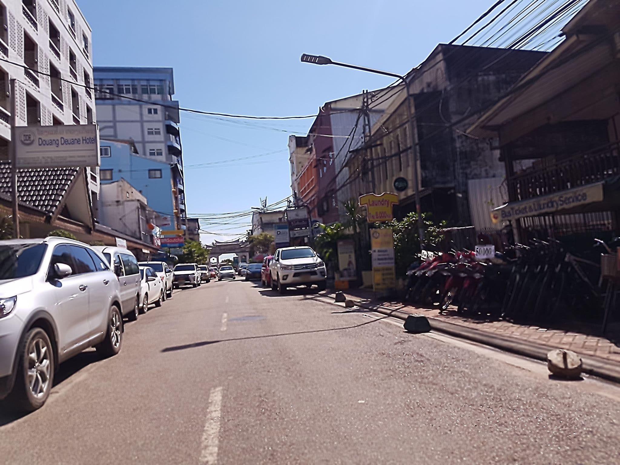Street view near DD, Vientiane — © mbethke (CC BY-SA · Mapillary)