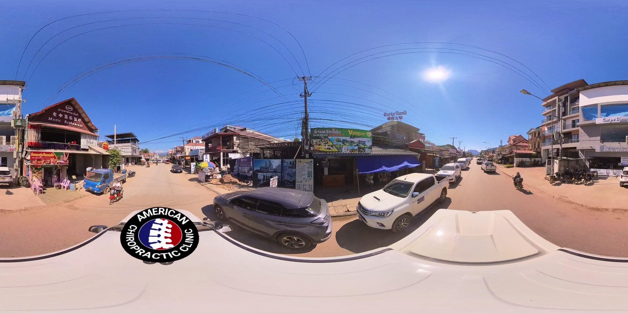 Street view near M&M Hotel, Vang Vieng — © DrLogan (CC BY-SA · Mapillary)