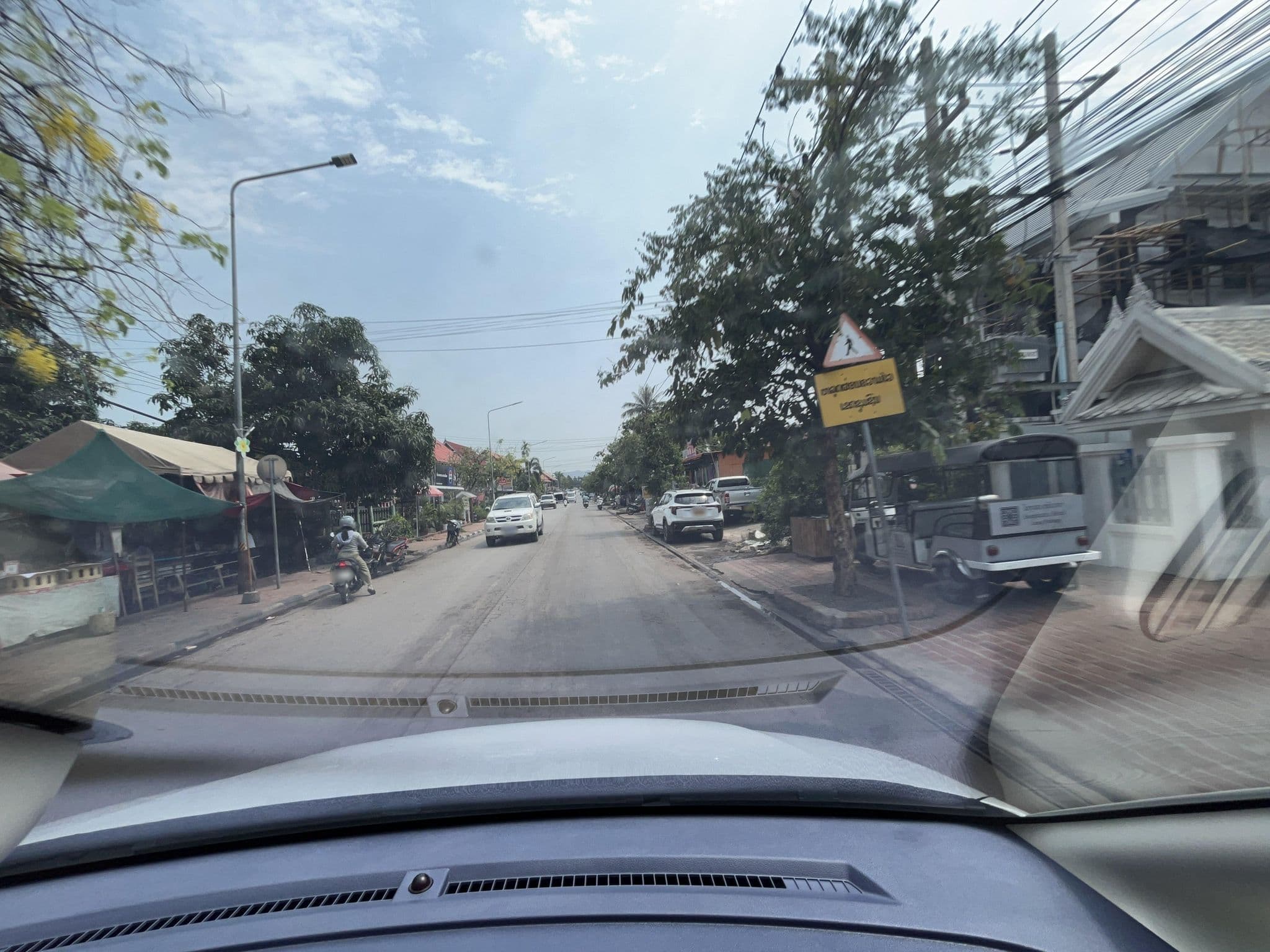 Street view near Souphattra Hotel Luang Prabang, Luang Prabang — © naokiosaka (CC BY-SA · Mapillary)