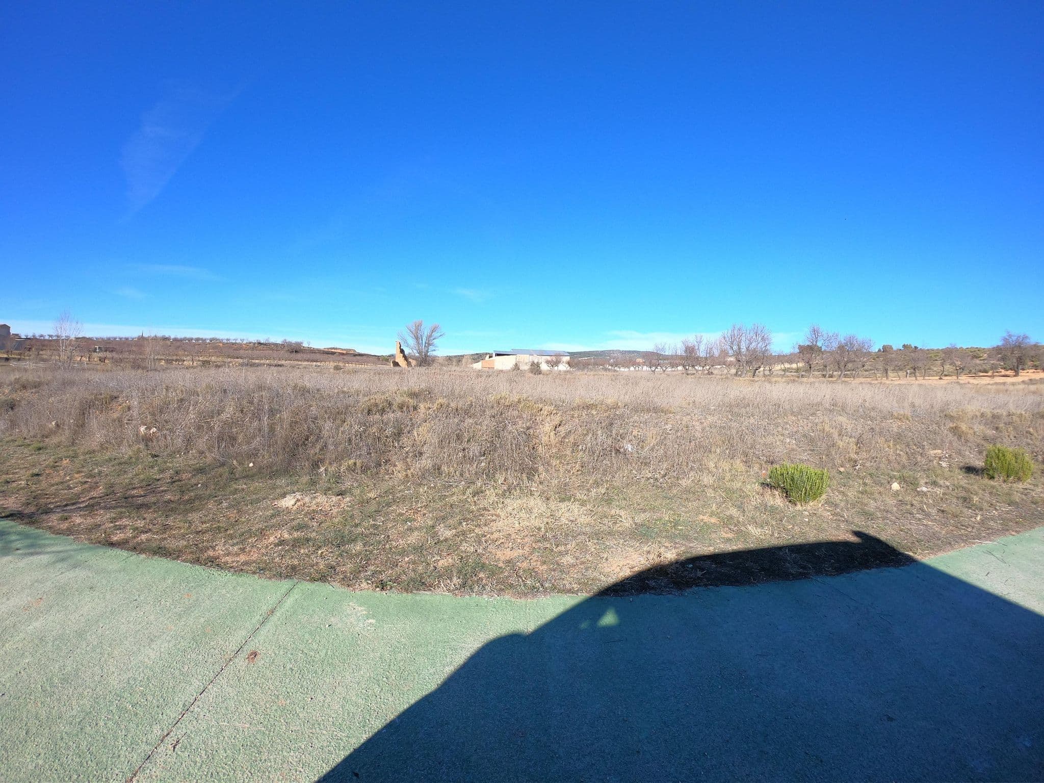 Street view near Área de Autocaravanas de La Yesa, Tuéjar — © joostjakob (CC BY-SA · Mapillary)