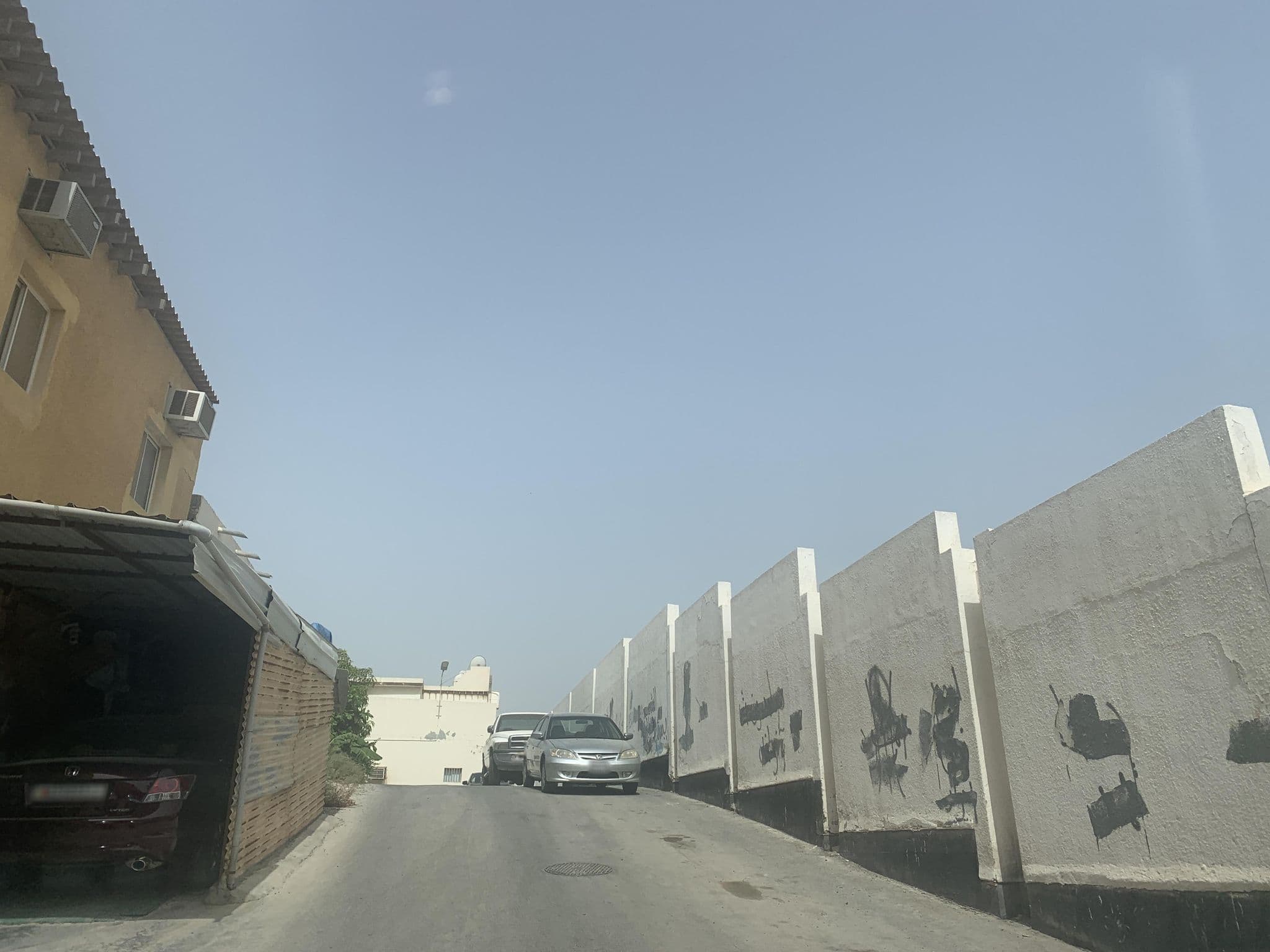 Street view near Bahrain, Jidd Ḩafş — © sherif1234 (CC BY-SA · Mapillary)