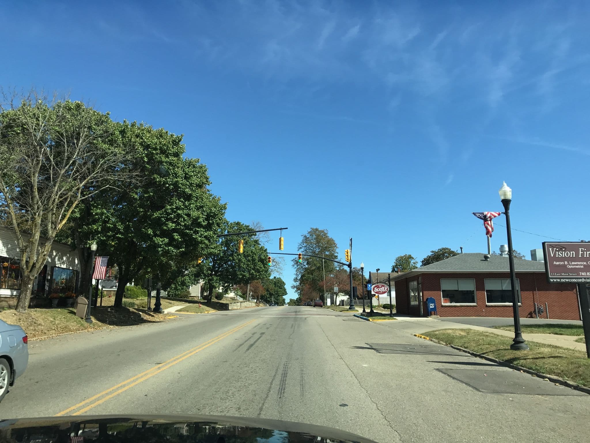 Street view near The Painted Cottage, New Concord — © mdroads (CC BY-SA · Mapillary)
