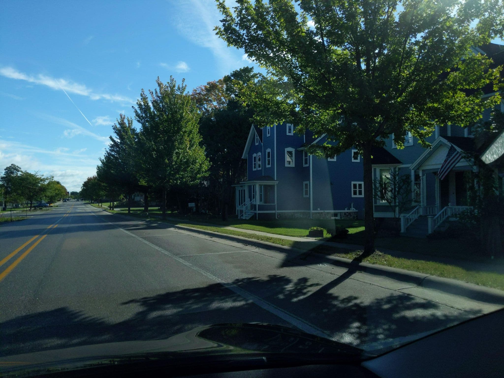 Street view near Ginny's River Street Cottage, Elk Rapids — © treestryder (CC BY-SA · Mapillary)