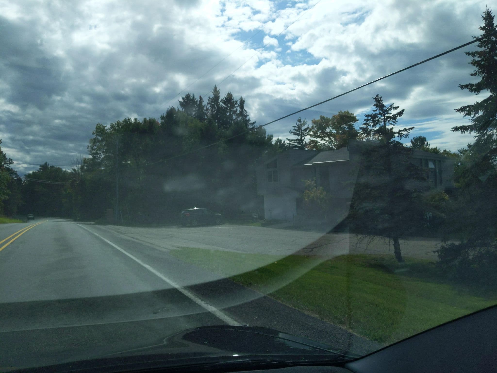 Street view near Sunset Torch Condominiums, Elk Rapids — © treestryder (CC BY-SA · Mapillary)