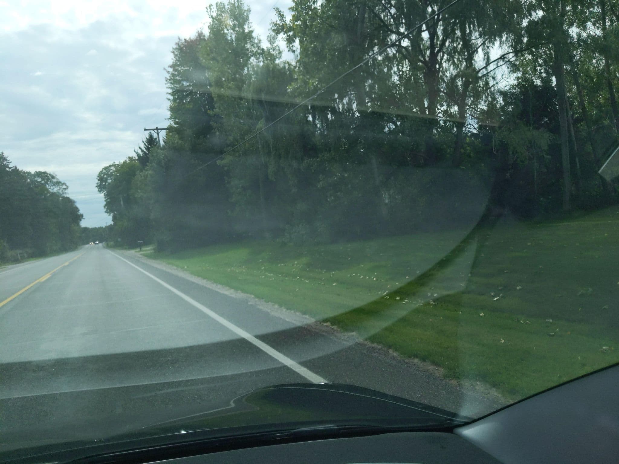 Street view near Brady's Vacation Cottage Rentals, Traverse City — © treestryder (CC BY-SA · Mapillary)
