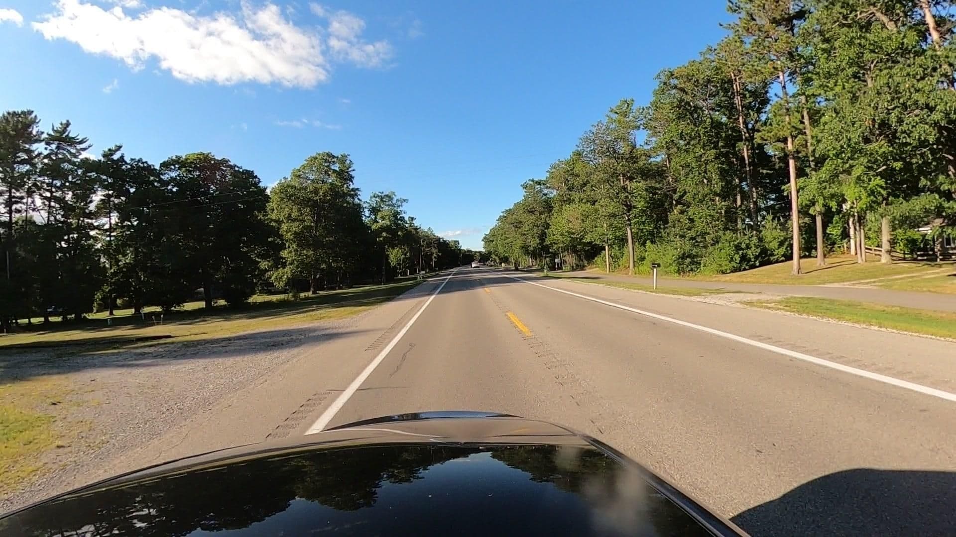Street view near Woodland Beach Cottages, Au Sable — © treestryder (CC BY-SA · Mapillary)
